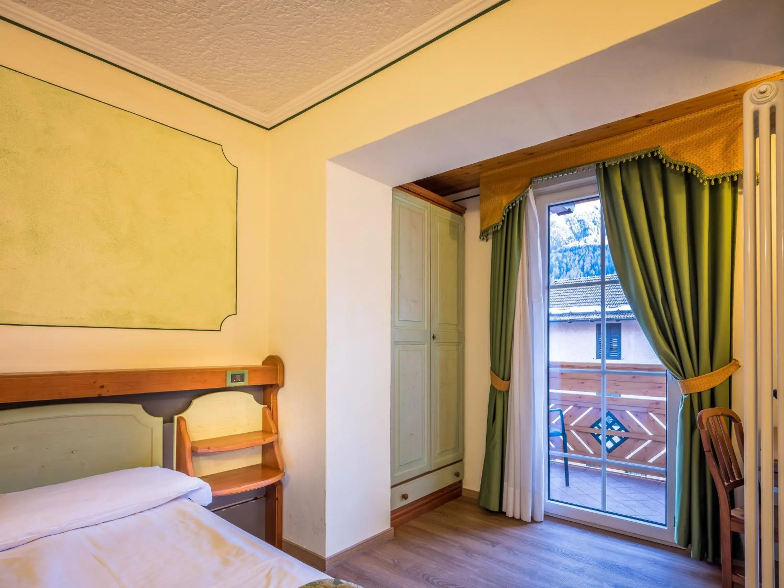 Comfort Twin Room with Balcony in Albergo Dimaro Wellness Hotel Comfort Twin Room with Balcony in Albergo Dimaro Wellness Hotel