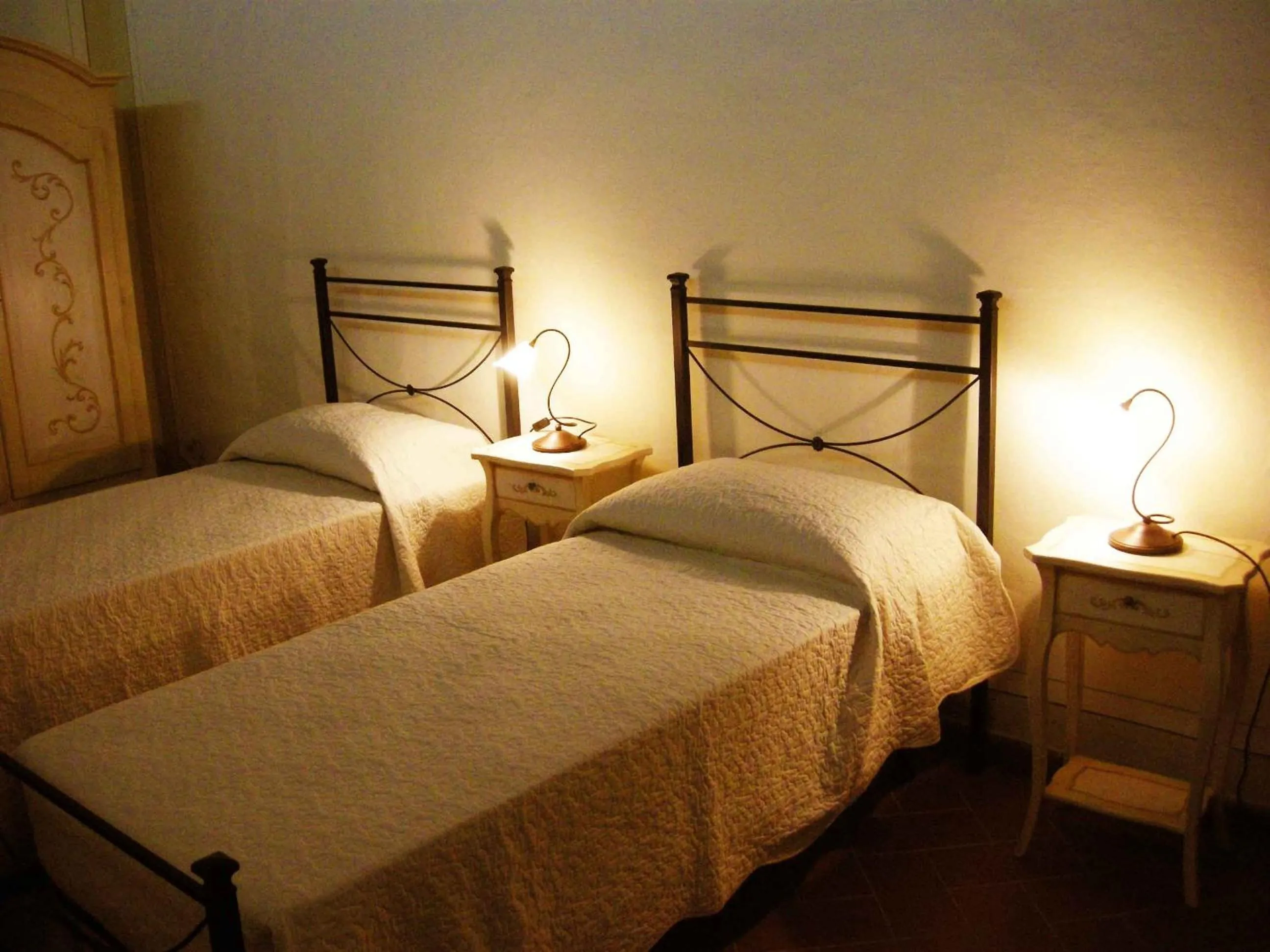 Bed in Relais Villa Sensano