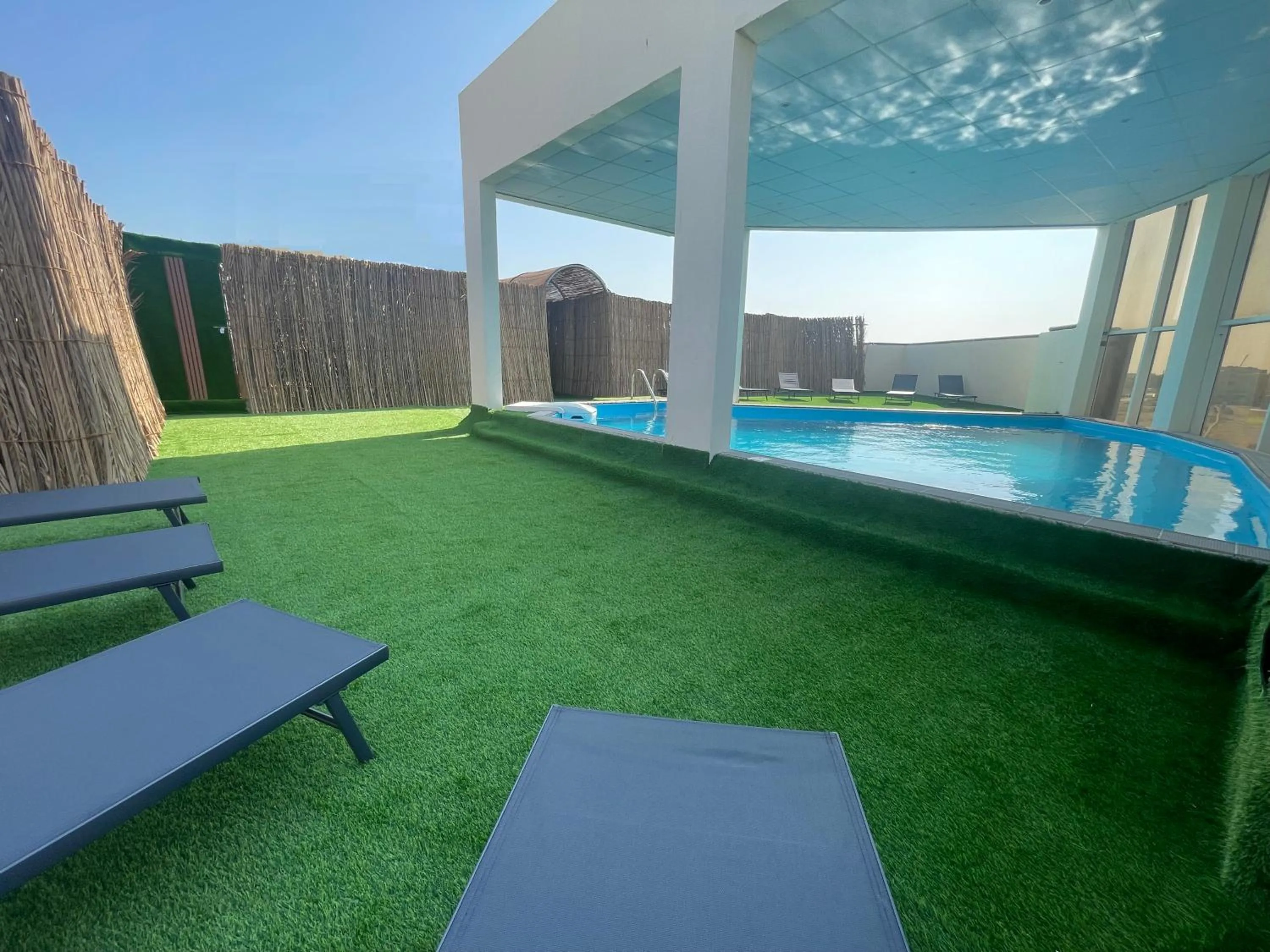 Swimming pool in Wakra Inn Hotel Apartments