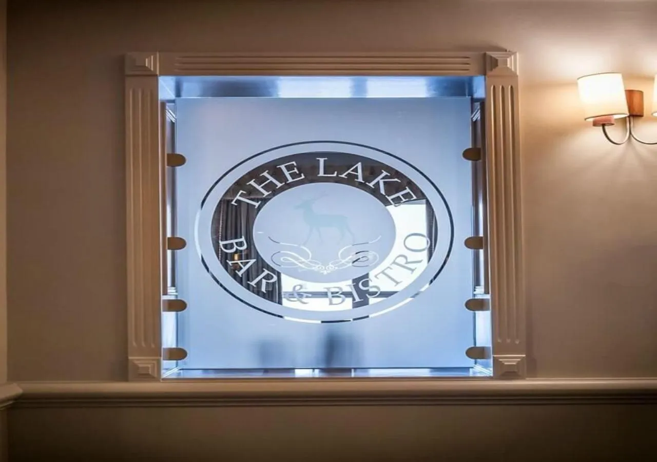 Property logo or sign in Lake of Shadows Hotel