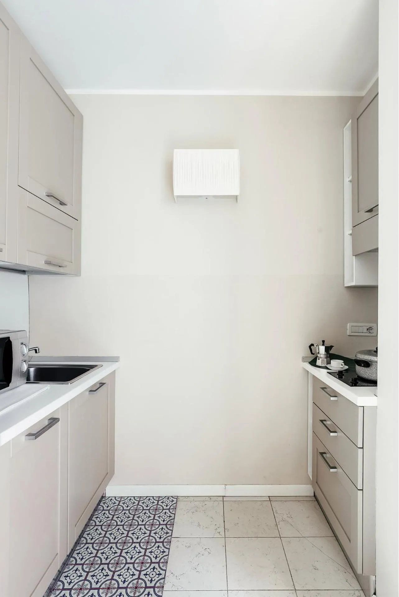 Kitchen or kitchenette in Adriano Residence