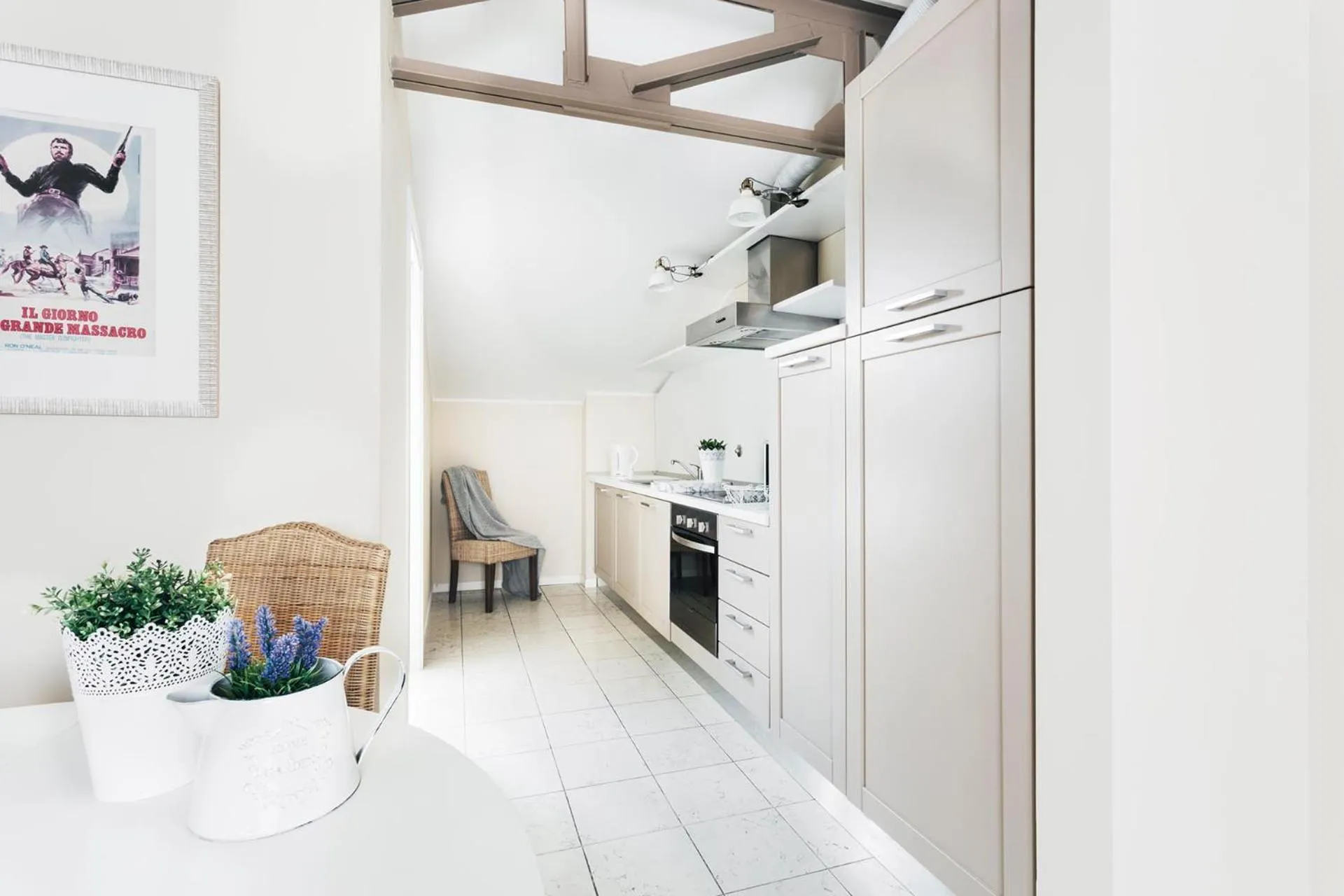 Kitchen or kitchenette in Adriano Residence