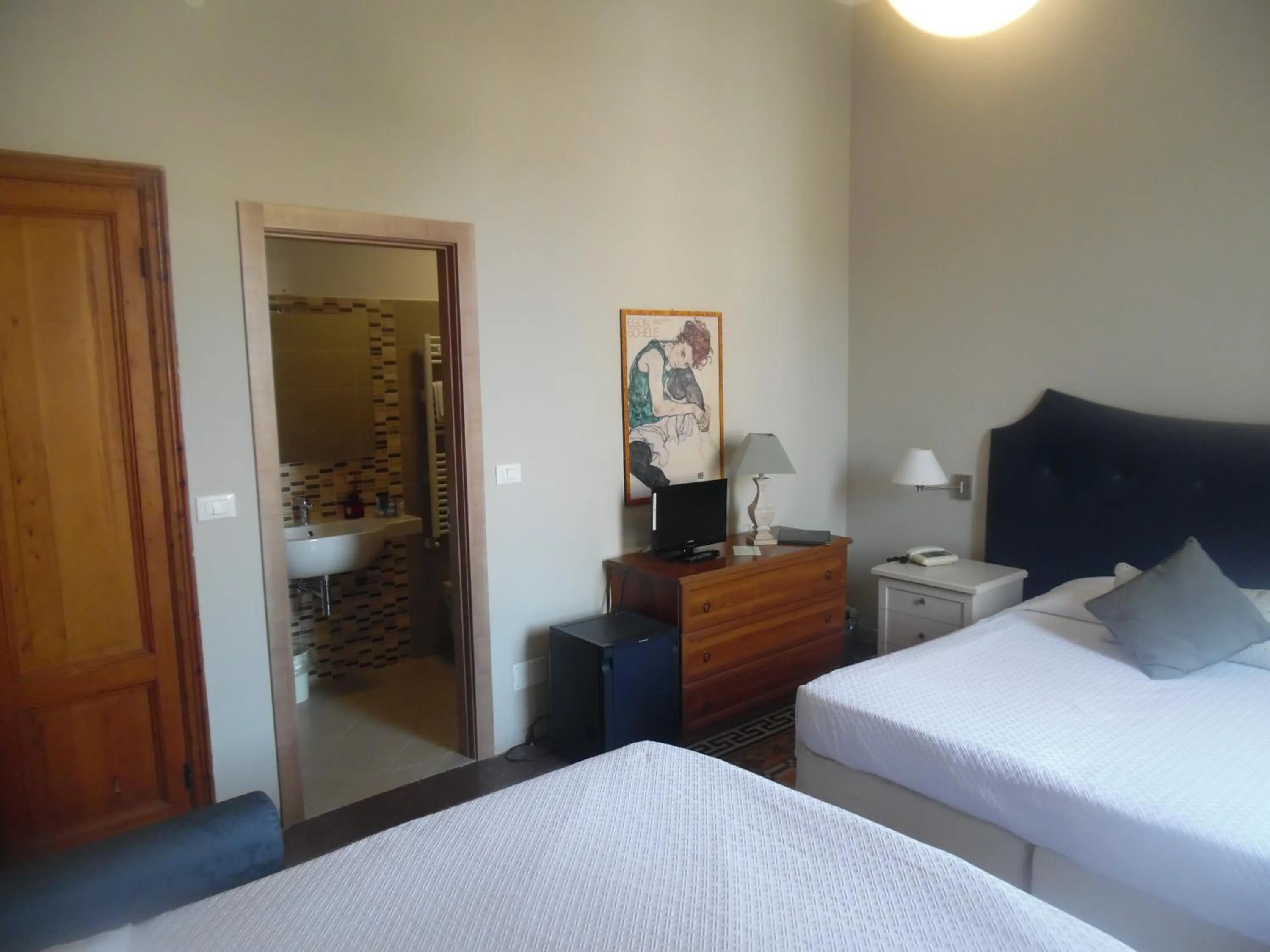 Bed in Hotel Miramare