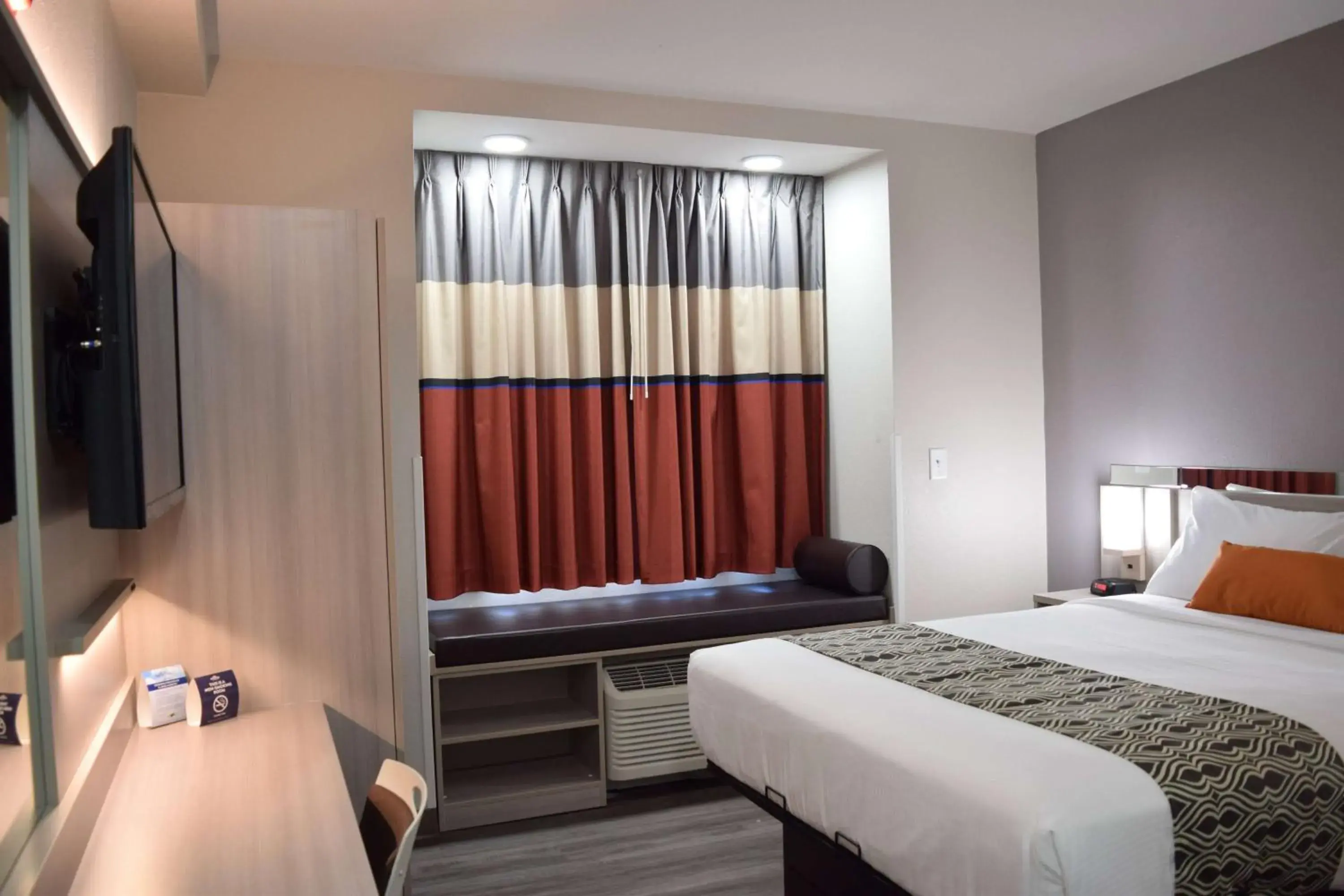 Photo of the whole room, Bed in Microtel Inn & Suites by Wyndham Raleigh Photo of the whole room, Bed in Microtel Inn & Suites by Wyndham Raleigh