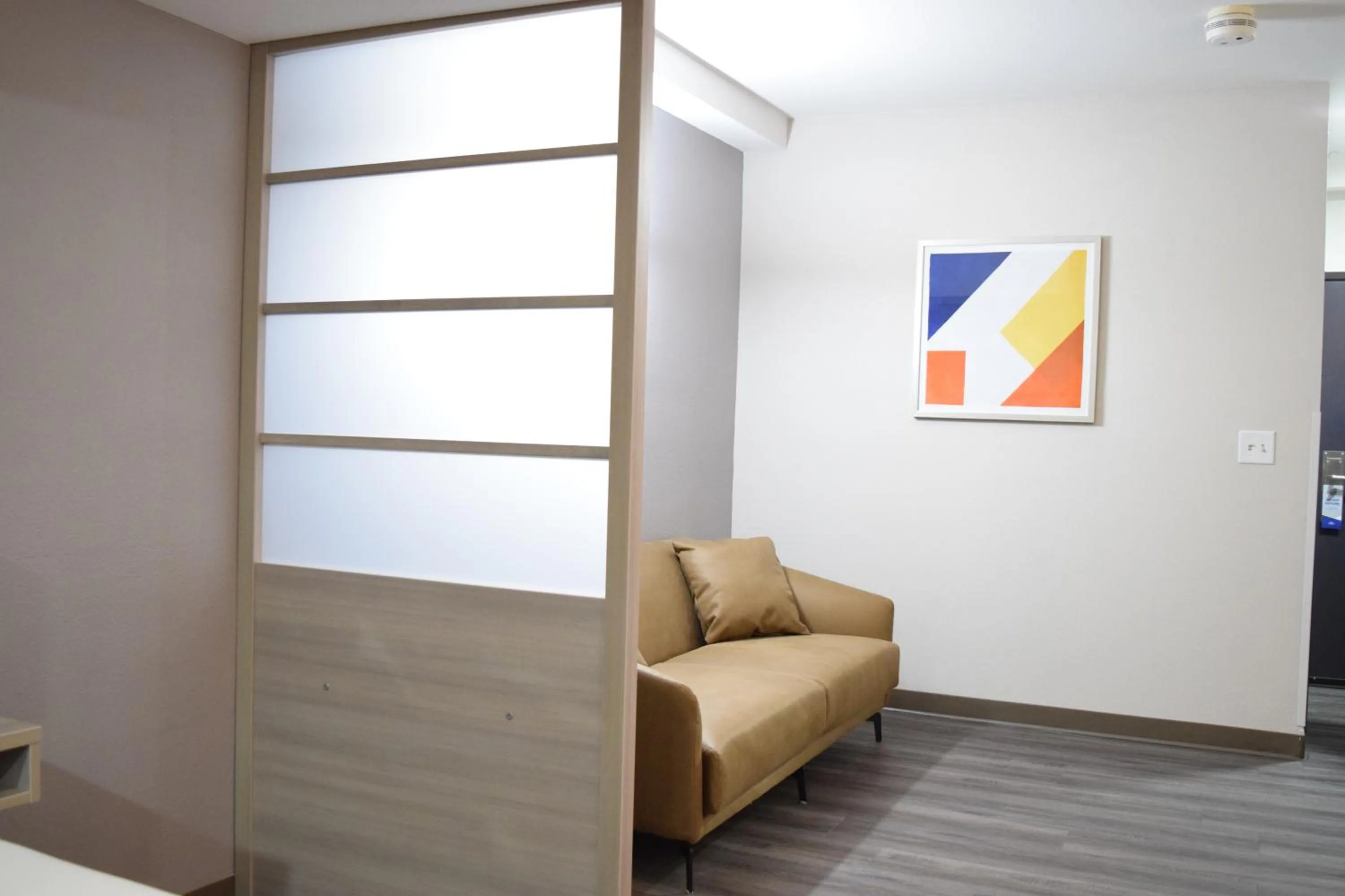 Seating area in Microtel Inn & Suites by Wyndham Raleigh