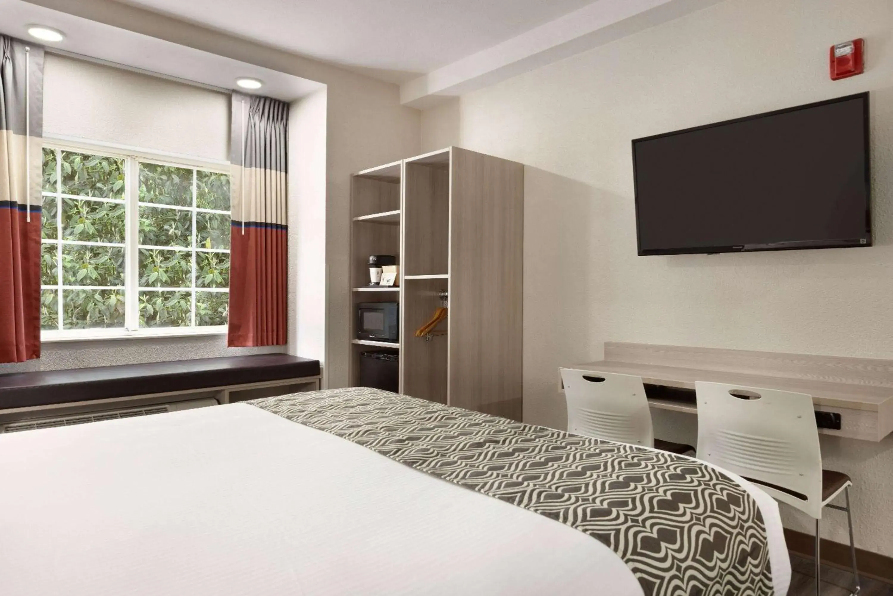 Photo of the whole room, Bed in Microtel Inn & Suites by Wyndham Raleigh Photo of the whole room, Bed in Microtel Inn & Suites by Wyndham Raleigh