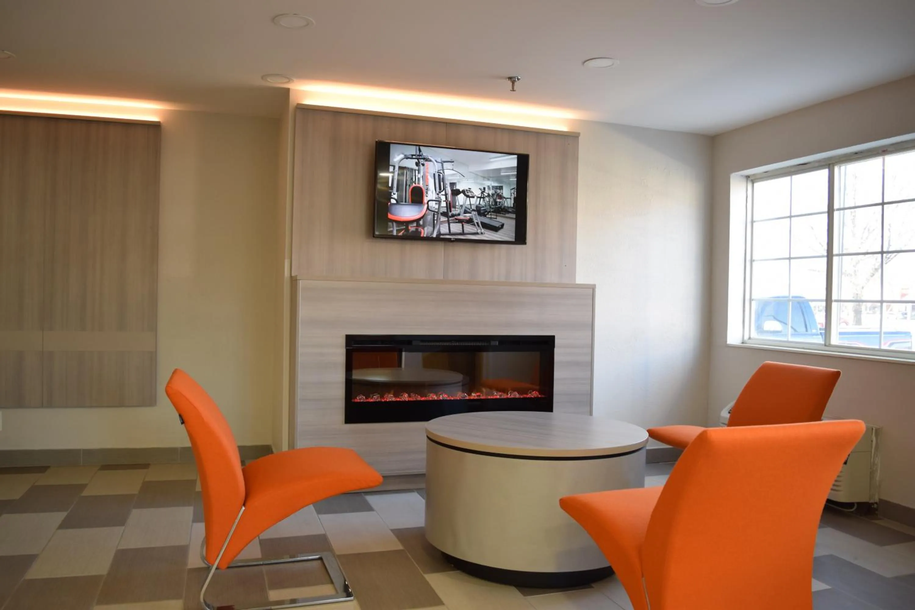 Seating area in Microtel Inn & Suites by Wyndham Raleigh