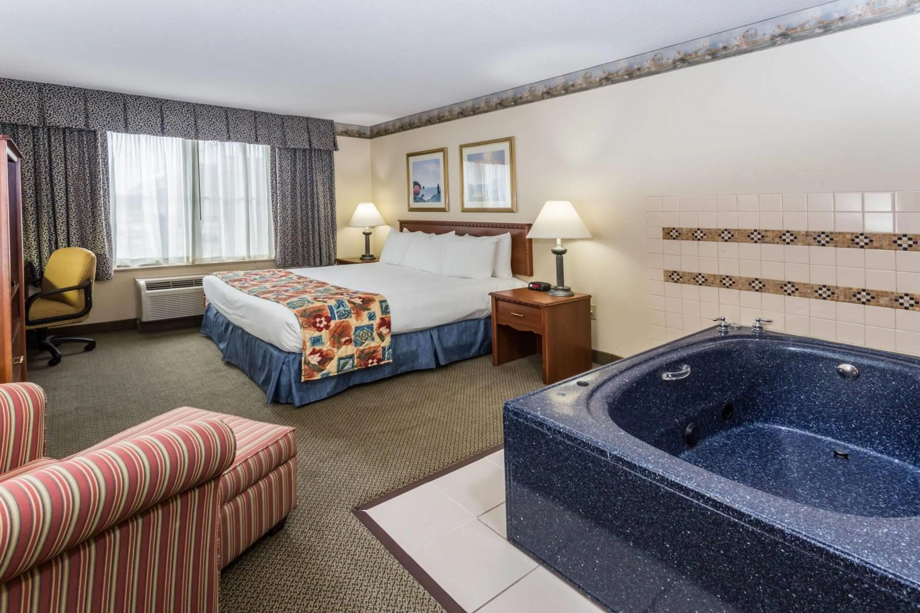 Photo of the whole room, Bed in Baymont by Wyndham Waterford/Burlington WI
