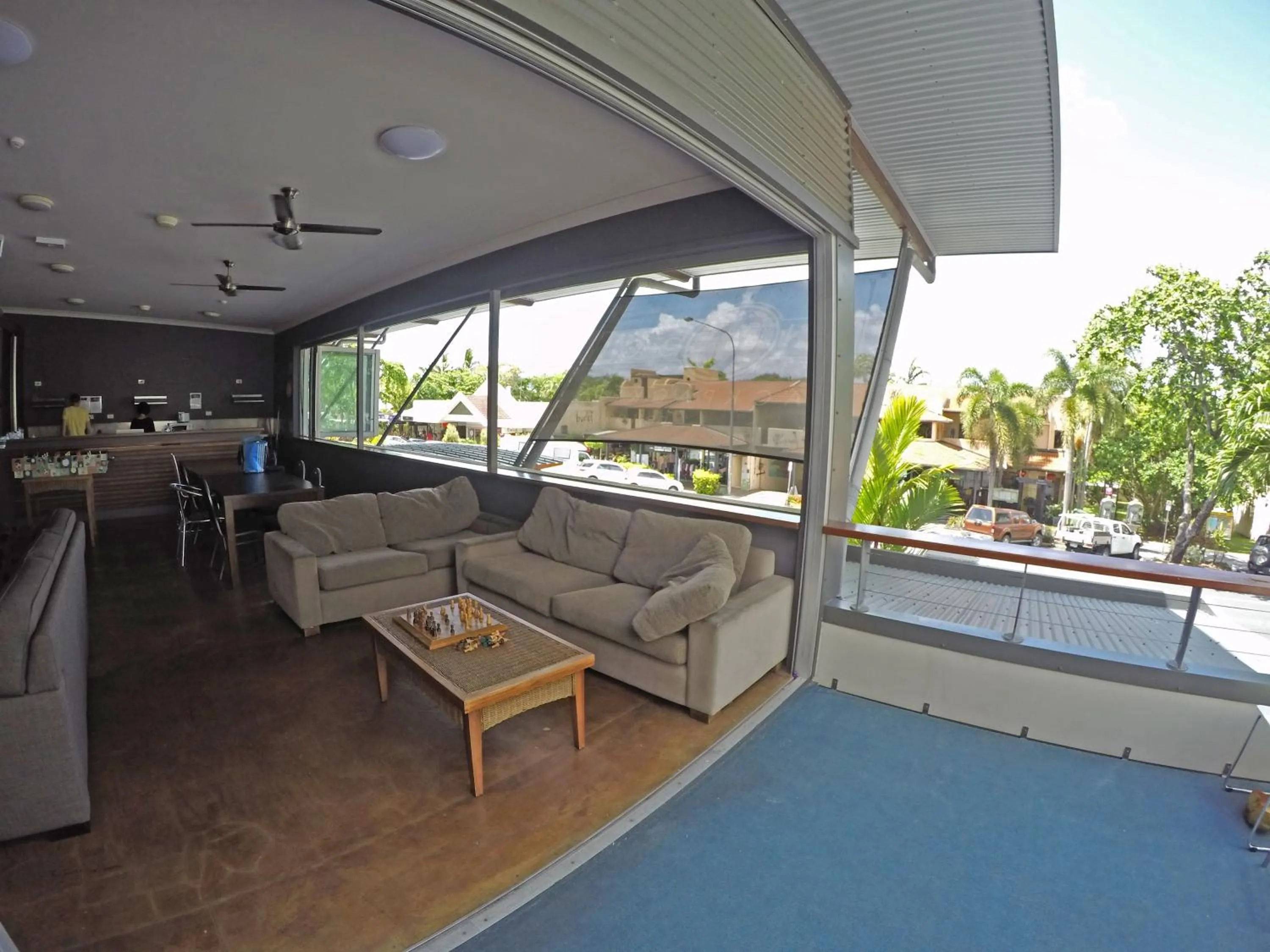 Communal lounge/ TV room in Global Backpackers Port Douglas