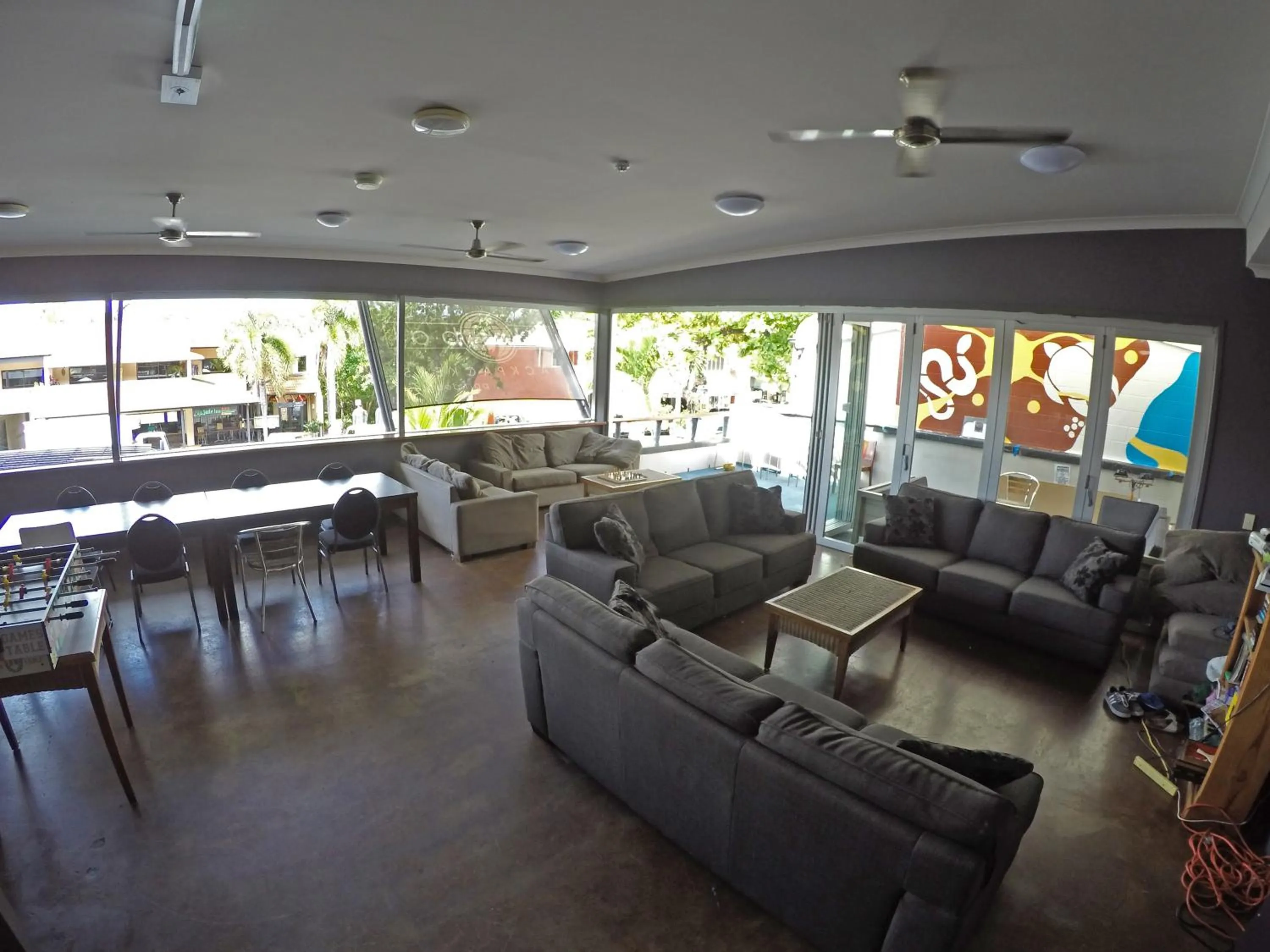 Communal lounge/ TV room in Global Backpackers Port Douglas