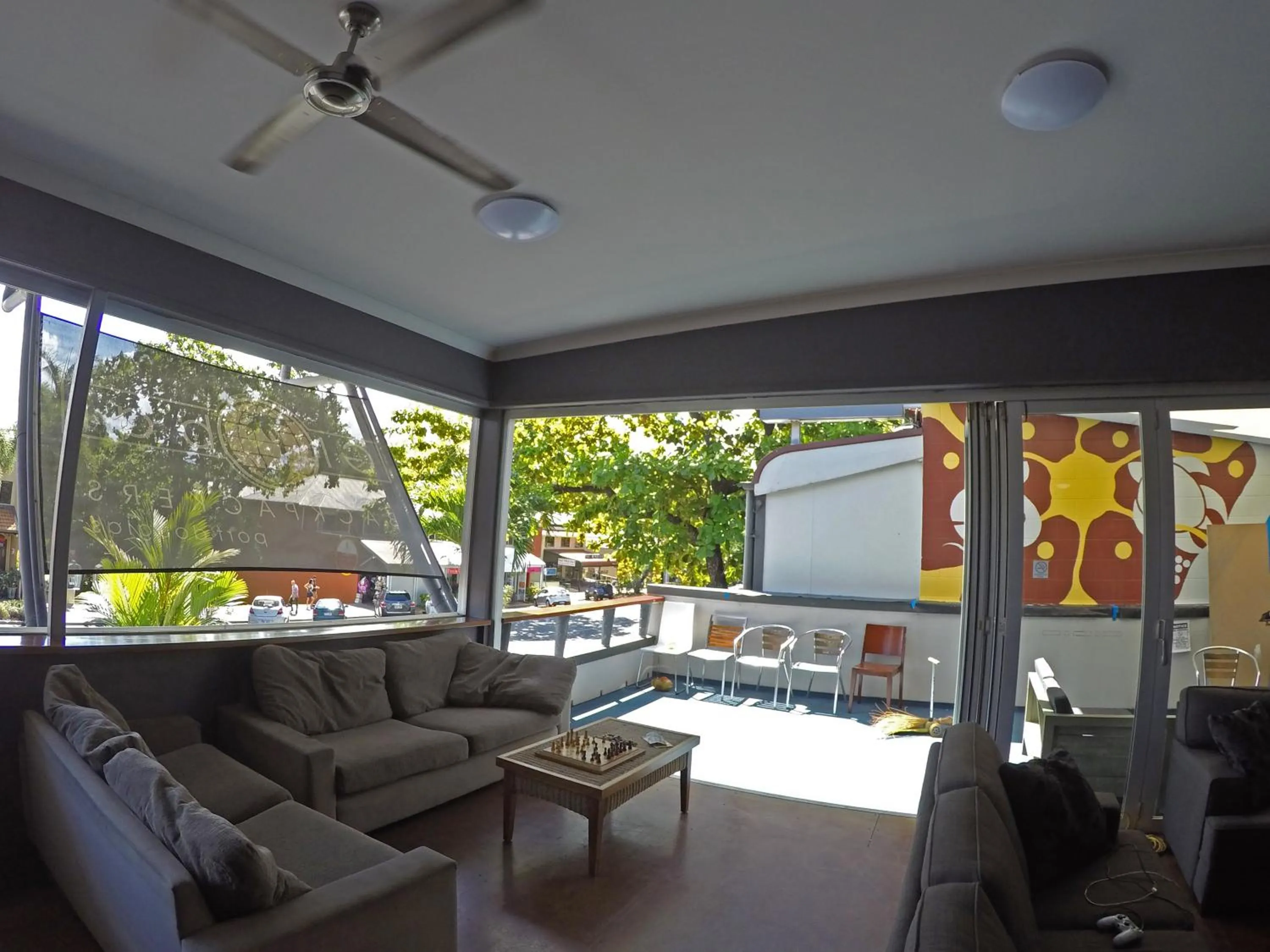 Communal lounge/ TV room in Global Backpackers Port Douglas