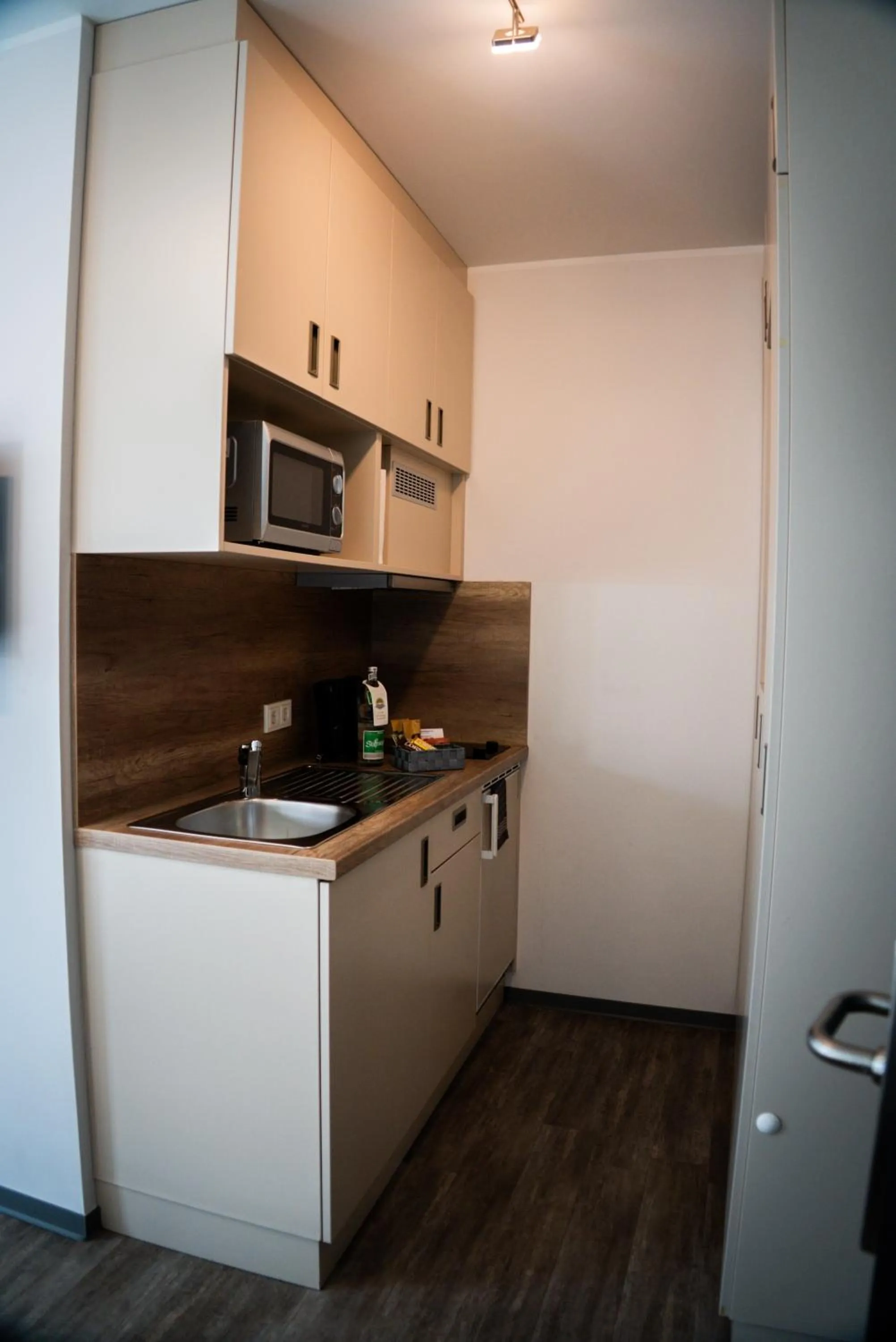 Kitchen or kitchenette in Hotel M24 - Alle Zimmer mit Küchenzeile