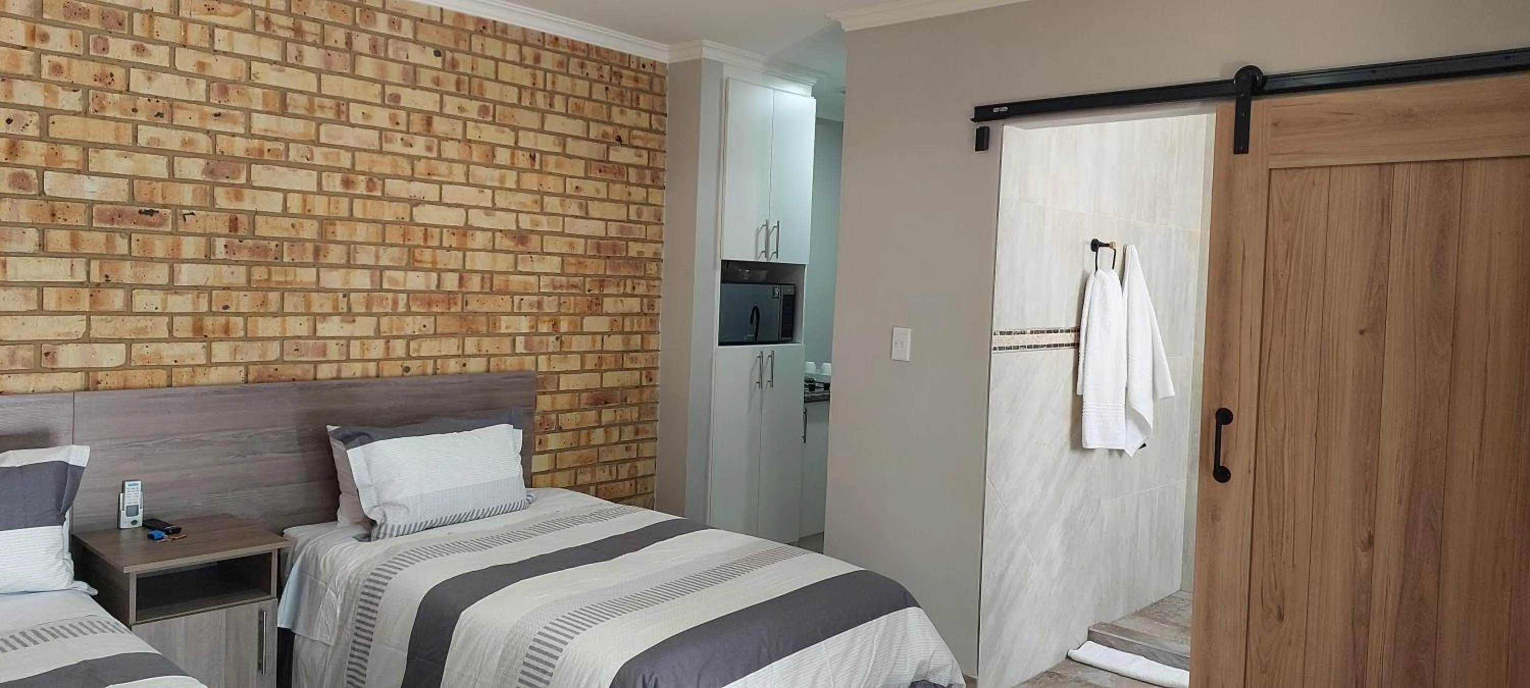 Bed in Twins Guest House Astoni
