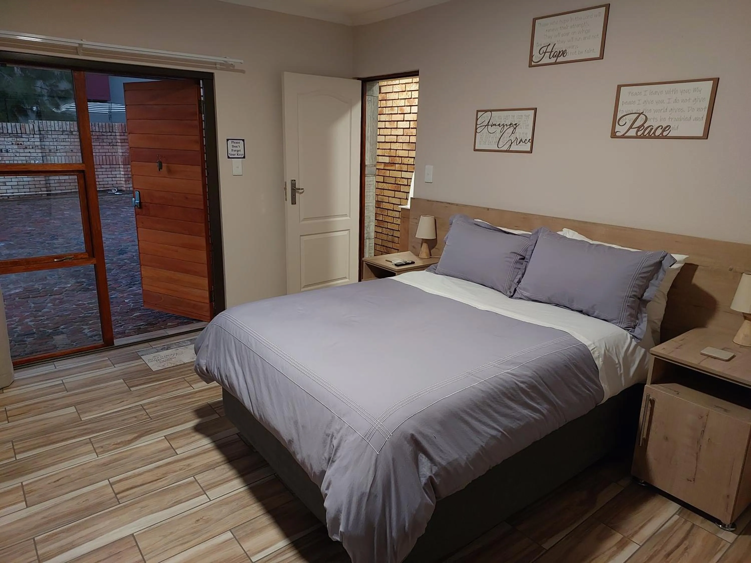 Bed in Twins Guest House Astoni
