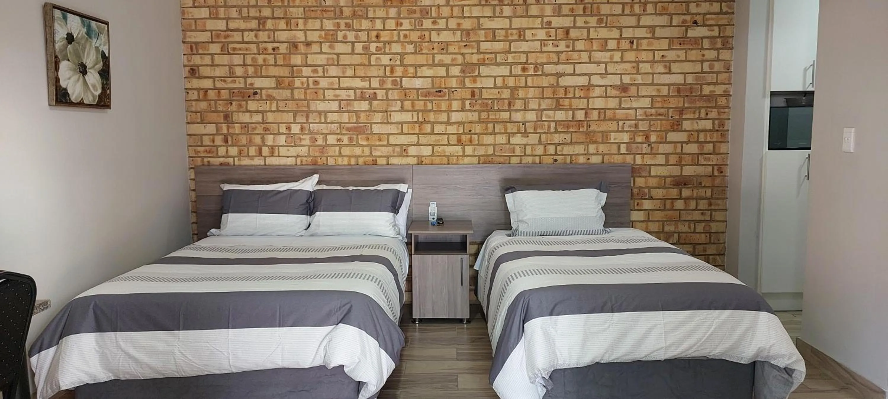 Bed in Twins Guest House Astoni