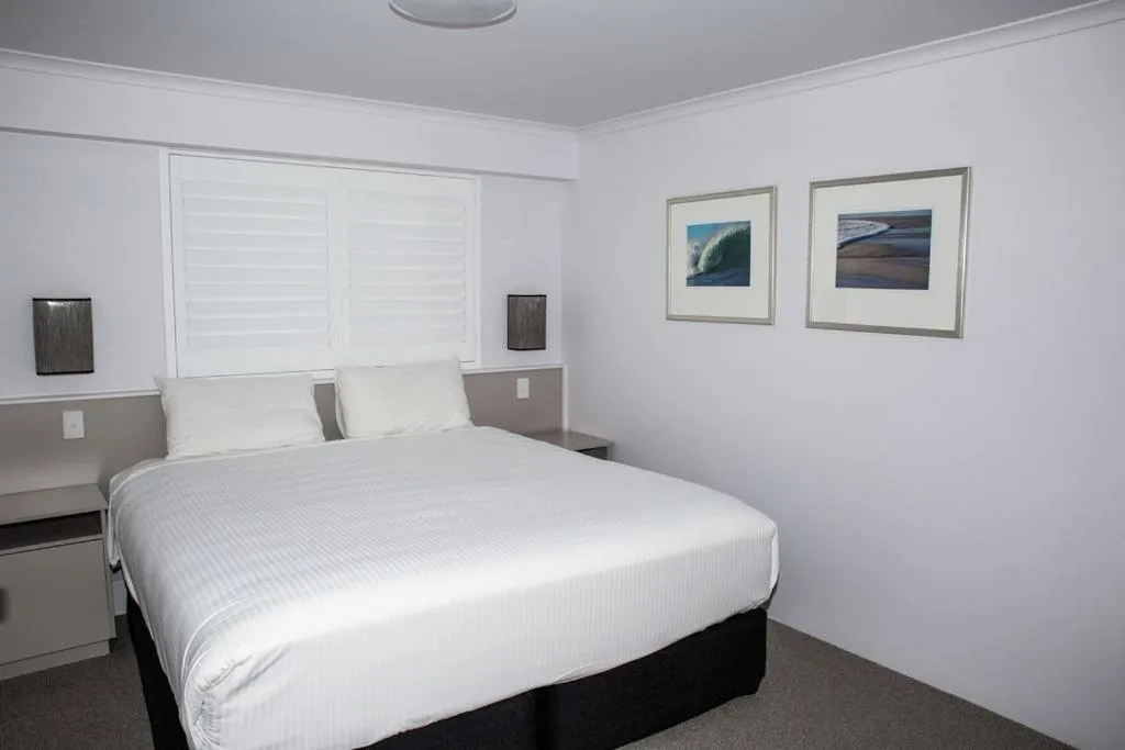Bed in Amooran Oceanside Apartments and Motel