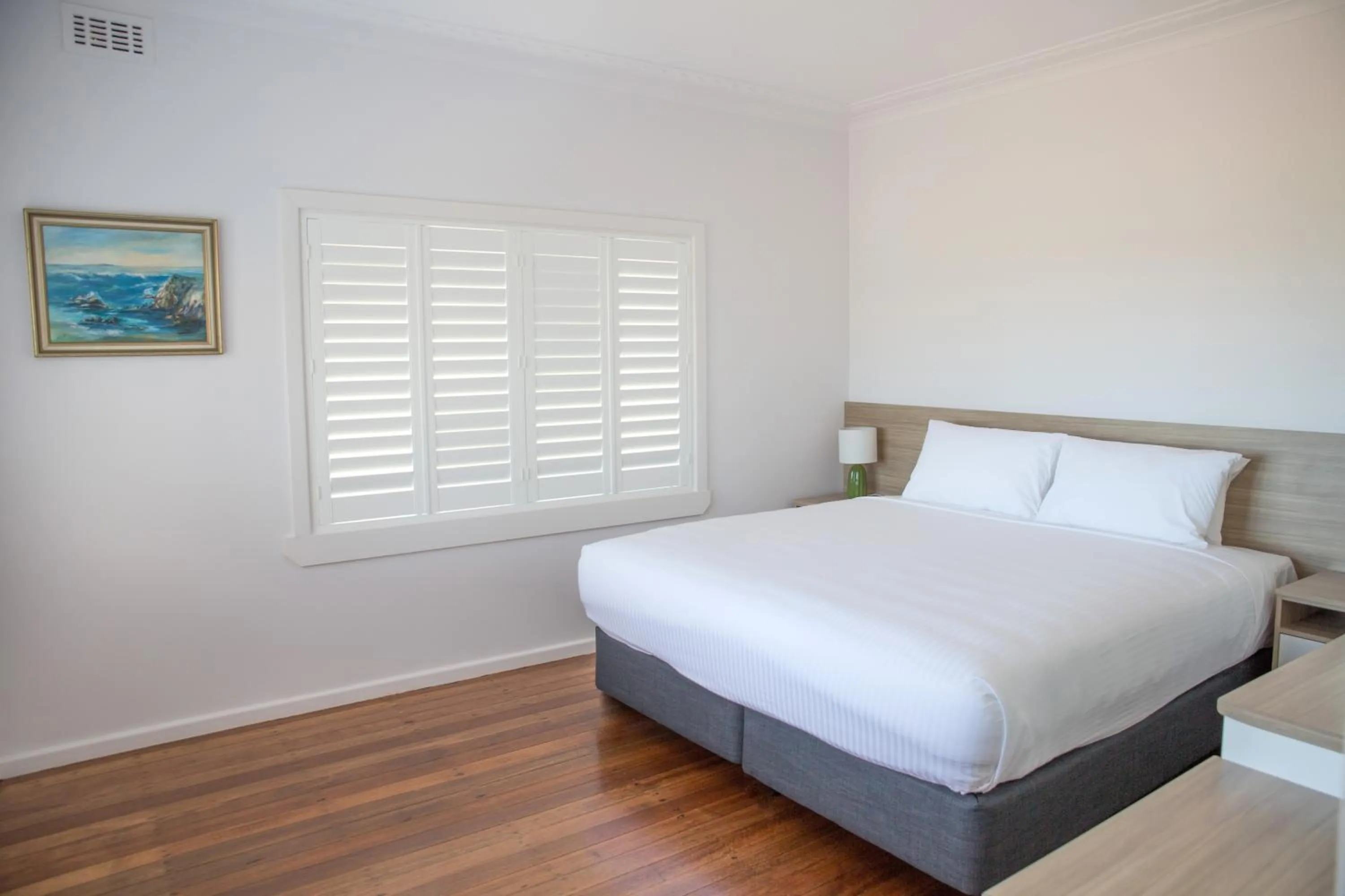 Bed in Amooran Oceanside Apartments and Motel