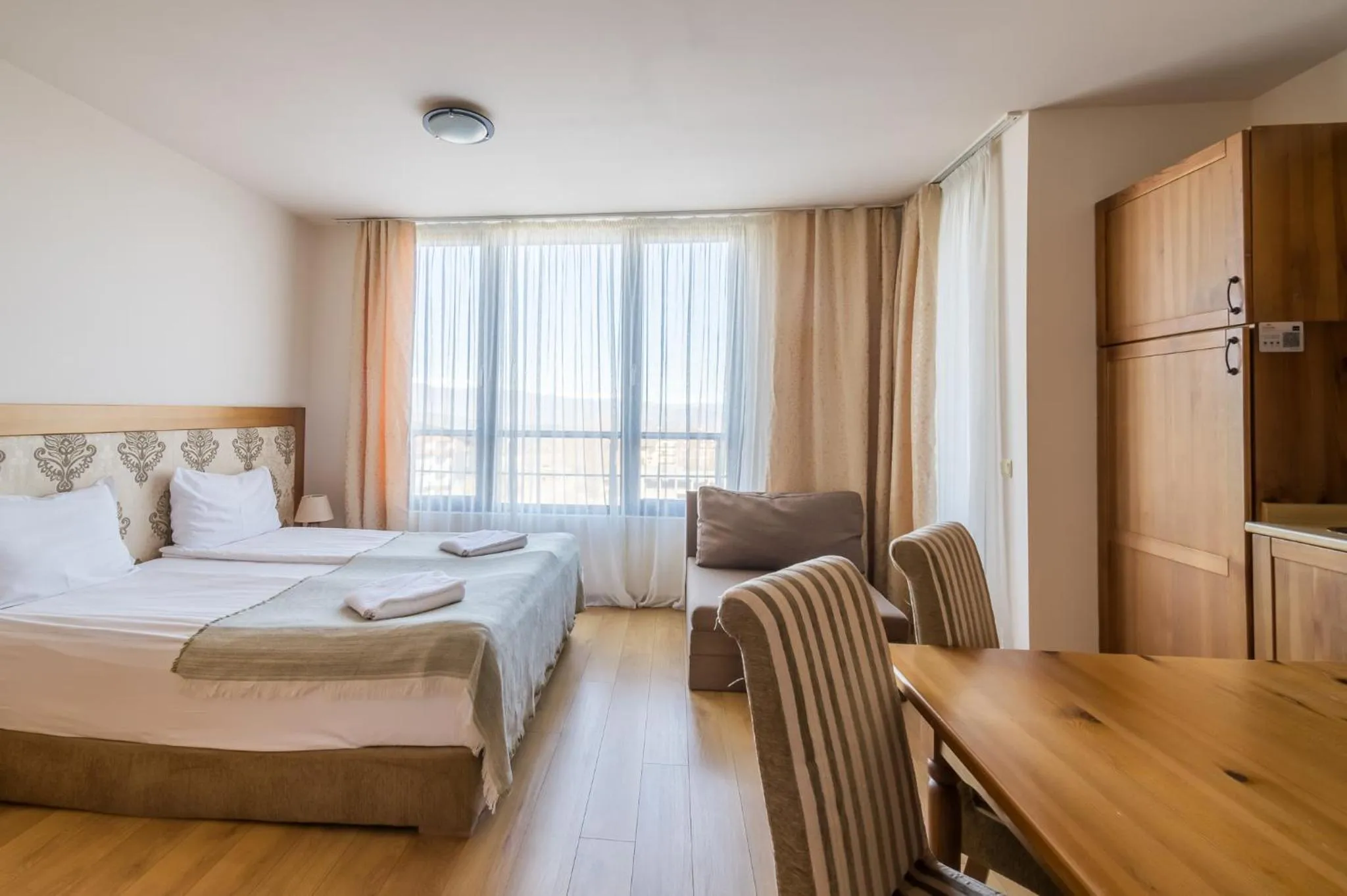 Bed in Cornelia Deluxe Residence