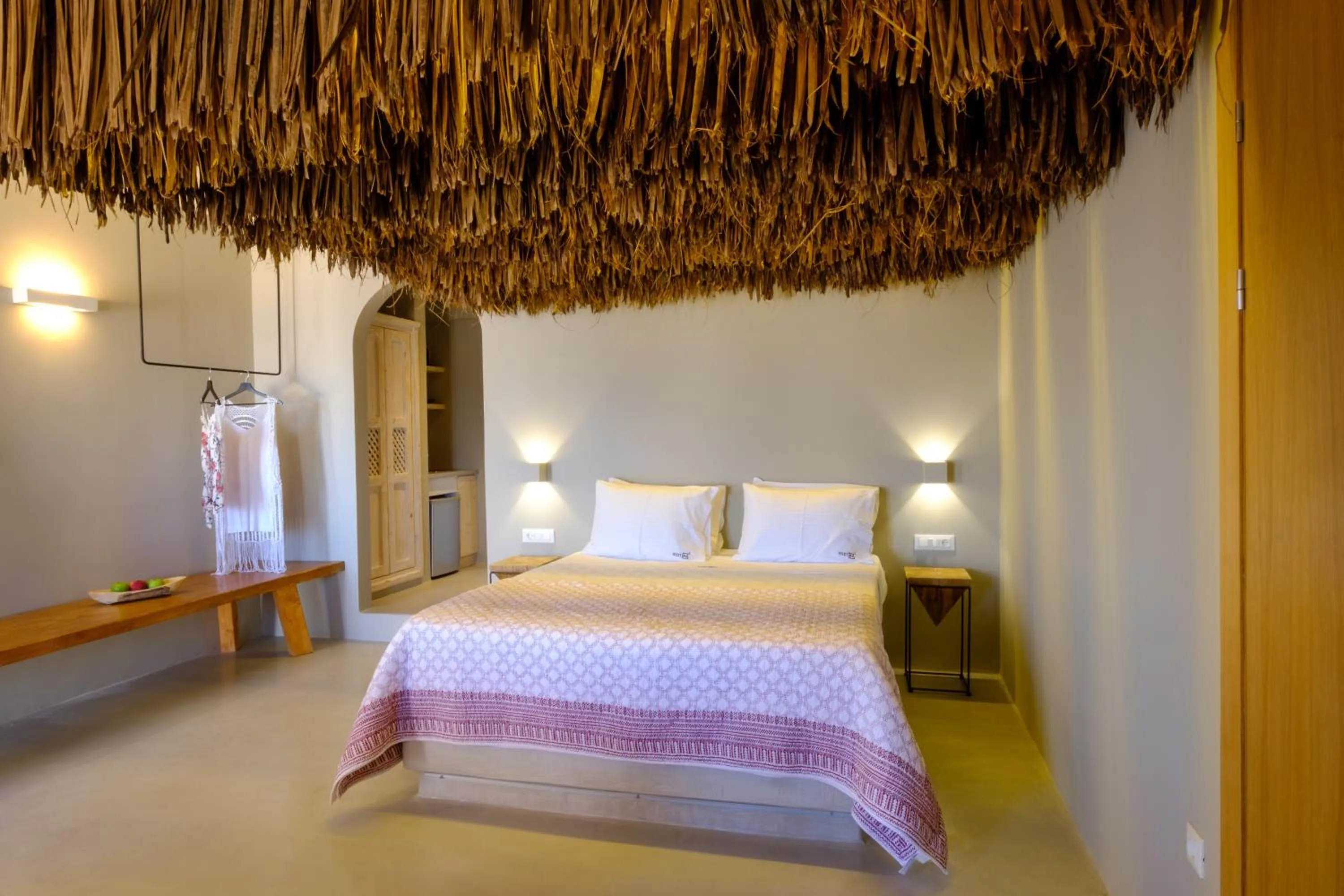 Bed in IfestAu.4 Suites