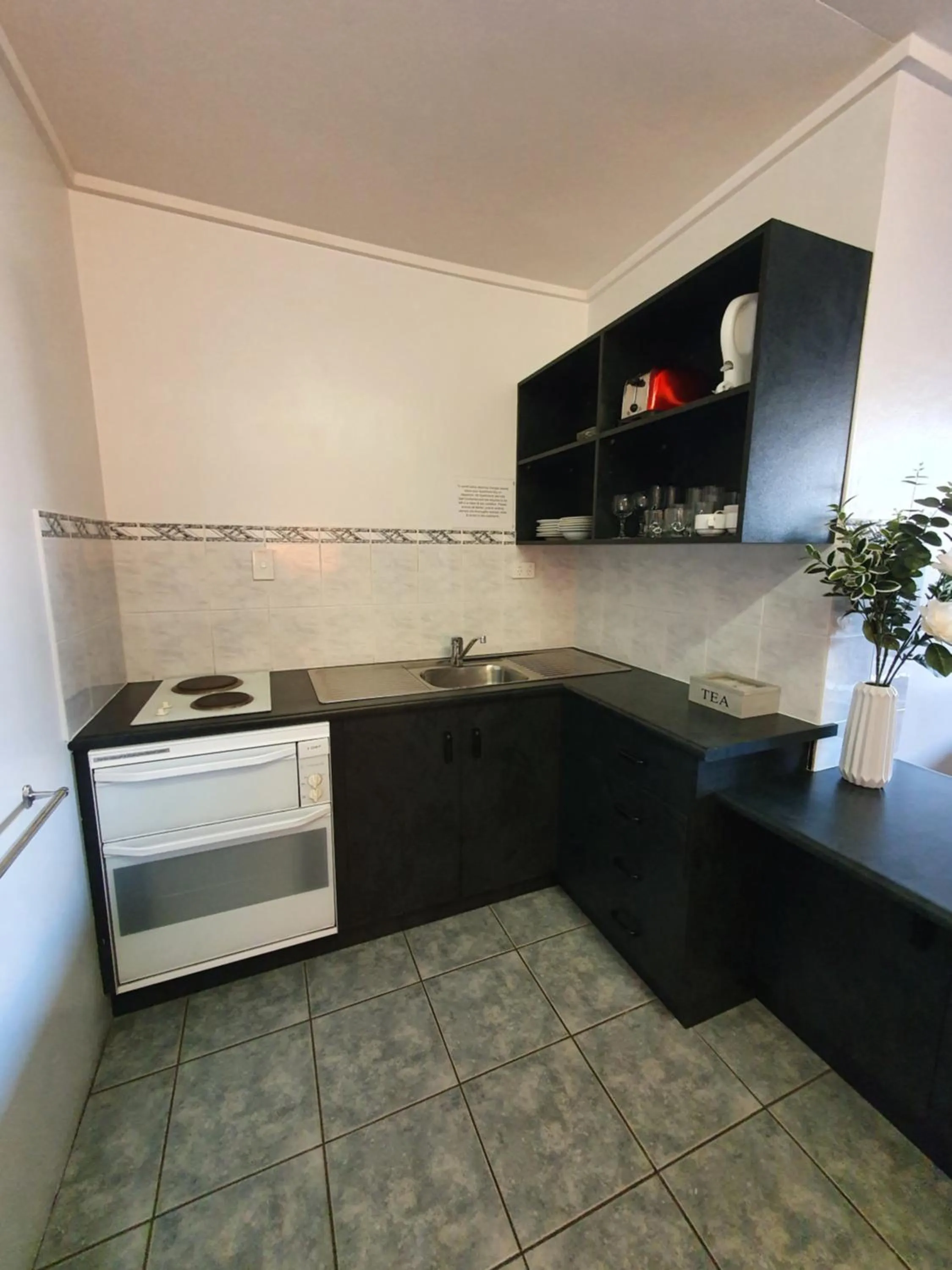 Kitchen or kitchenette in Sunseeker Motel