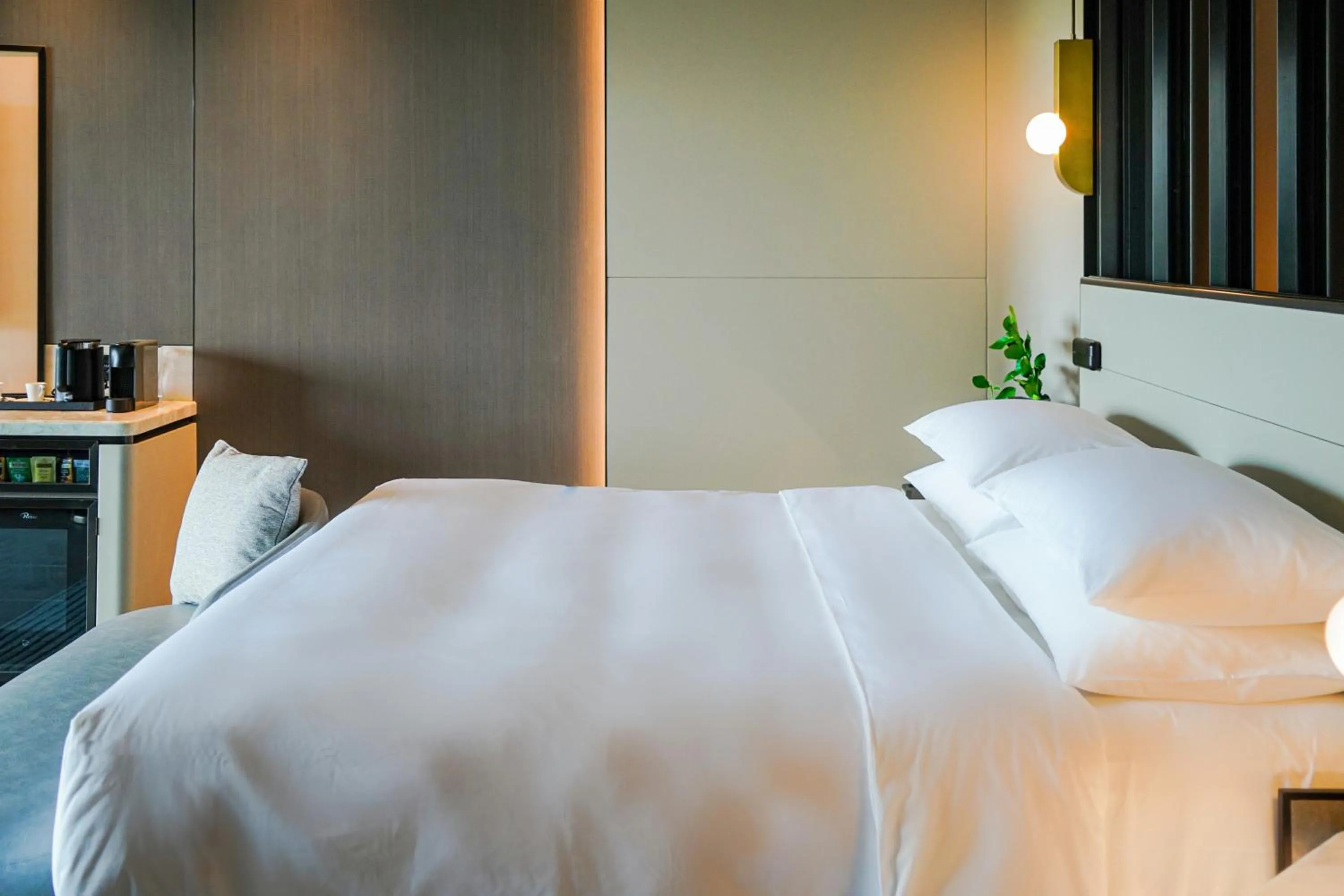 Photo of the whole room, Bed in InterContinental Shanghai Harbour City by IHG