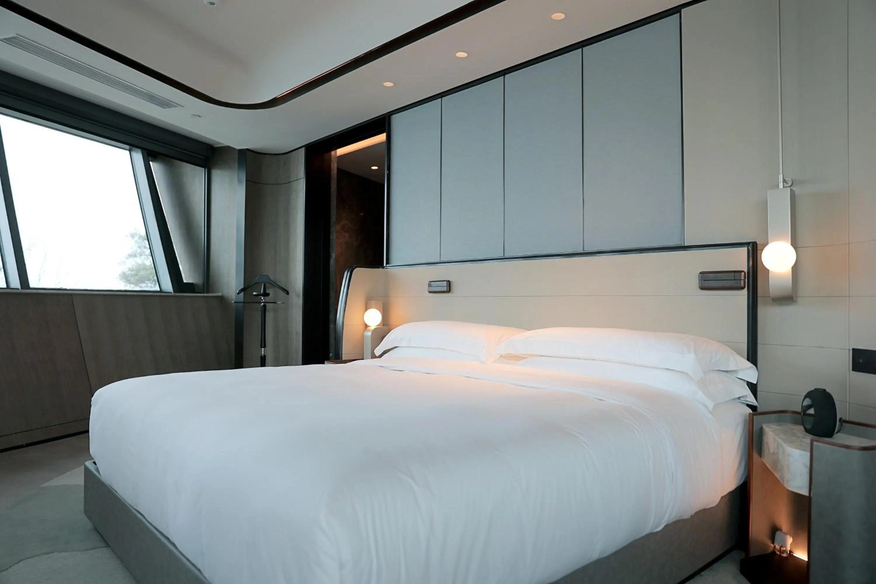 Photo of the whole room, Bed in InterContinental Shanghai Harbour City by IHG