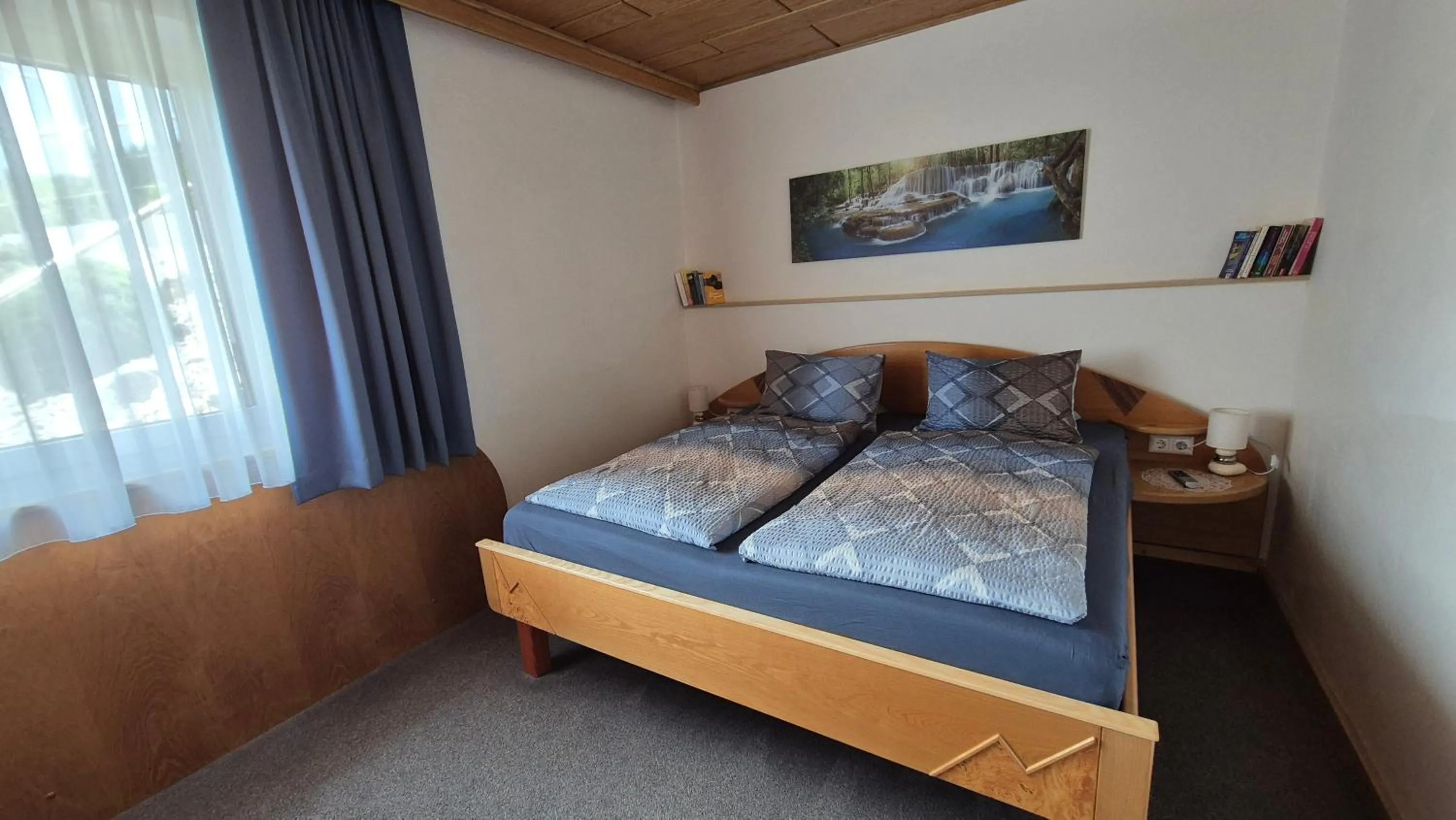 Bed in Ferienwohnungen Oranhof