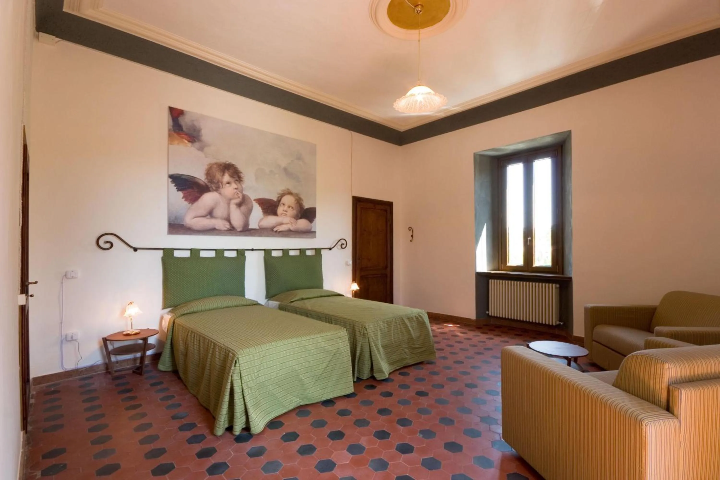 Photo of the whole room, Bed in Raffaello Residence