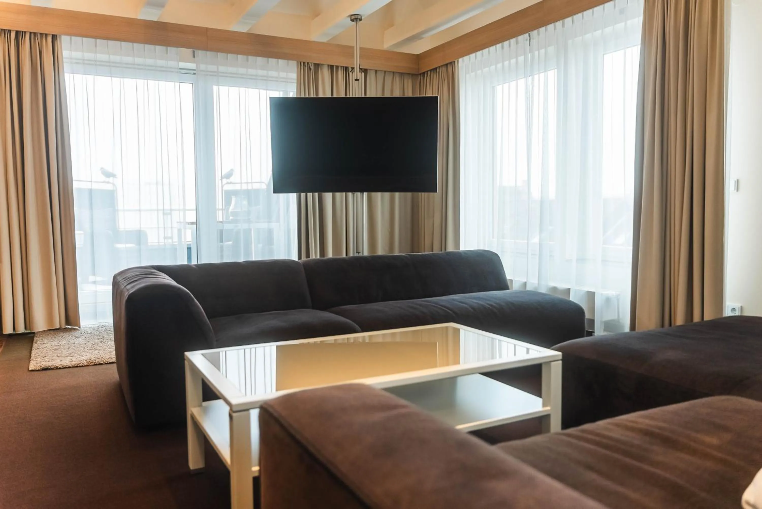 Communal lounge/ TV room in Hotel Villa Will