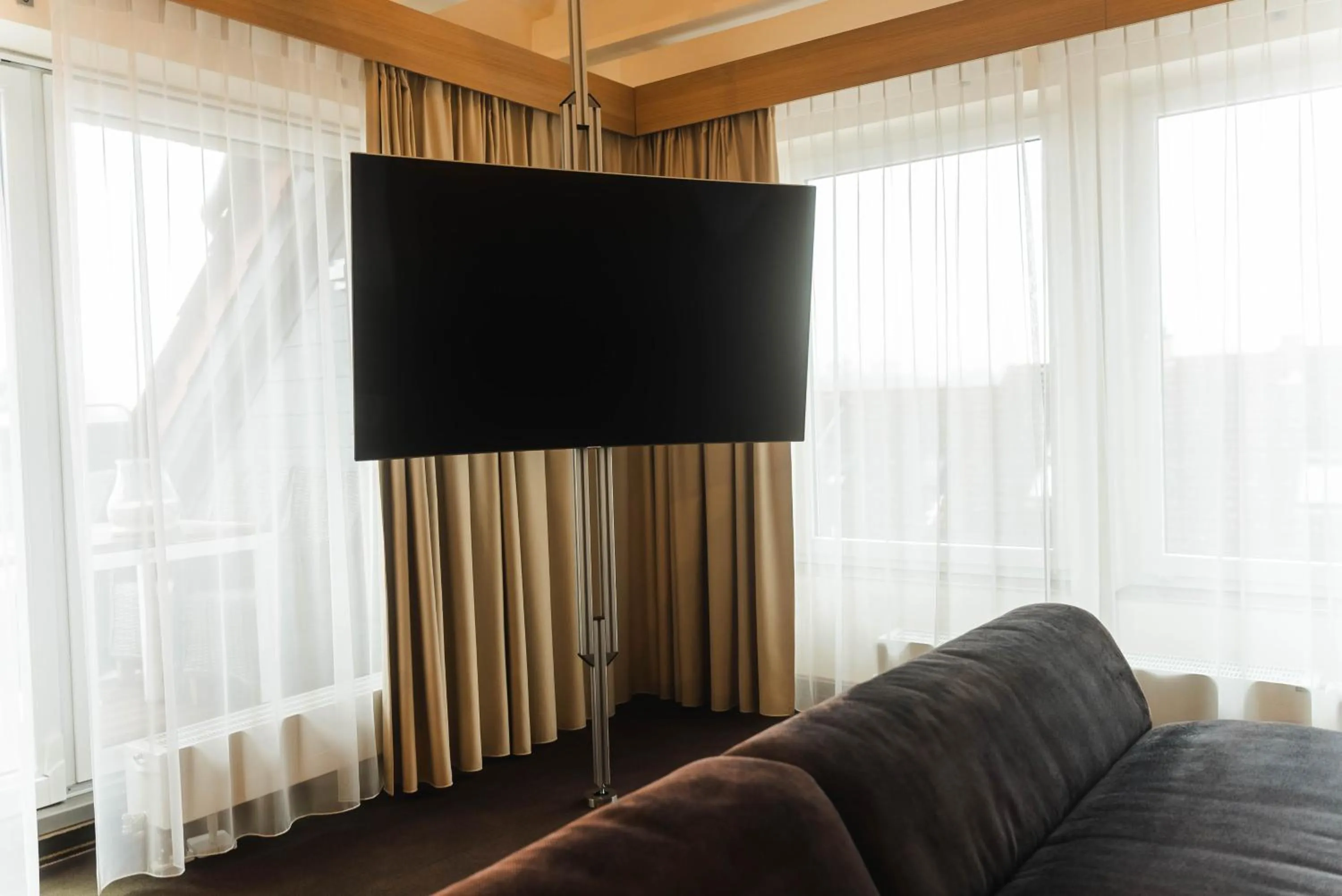 Communal lounge/ TV room in Hotel Villa Will