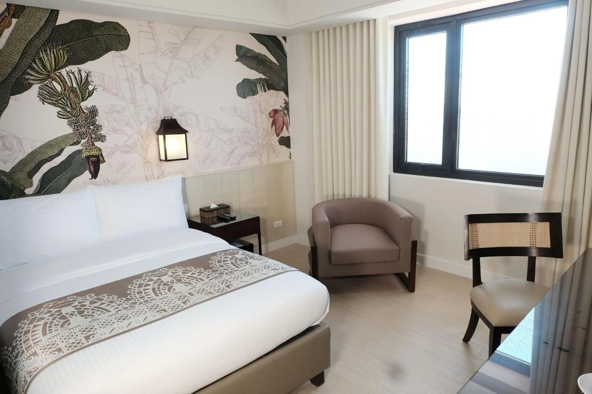 Bed in Mella Hotel Manila near NAIA Airport