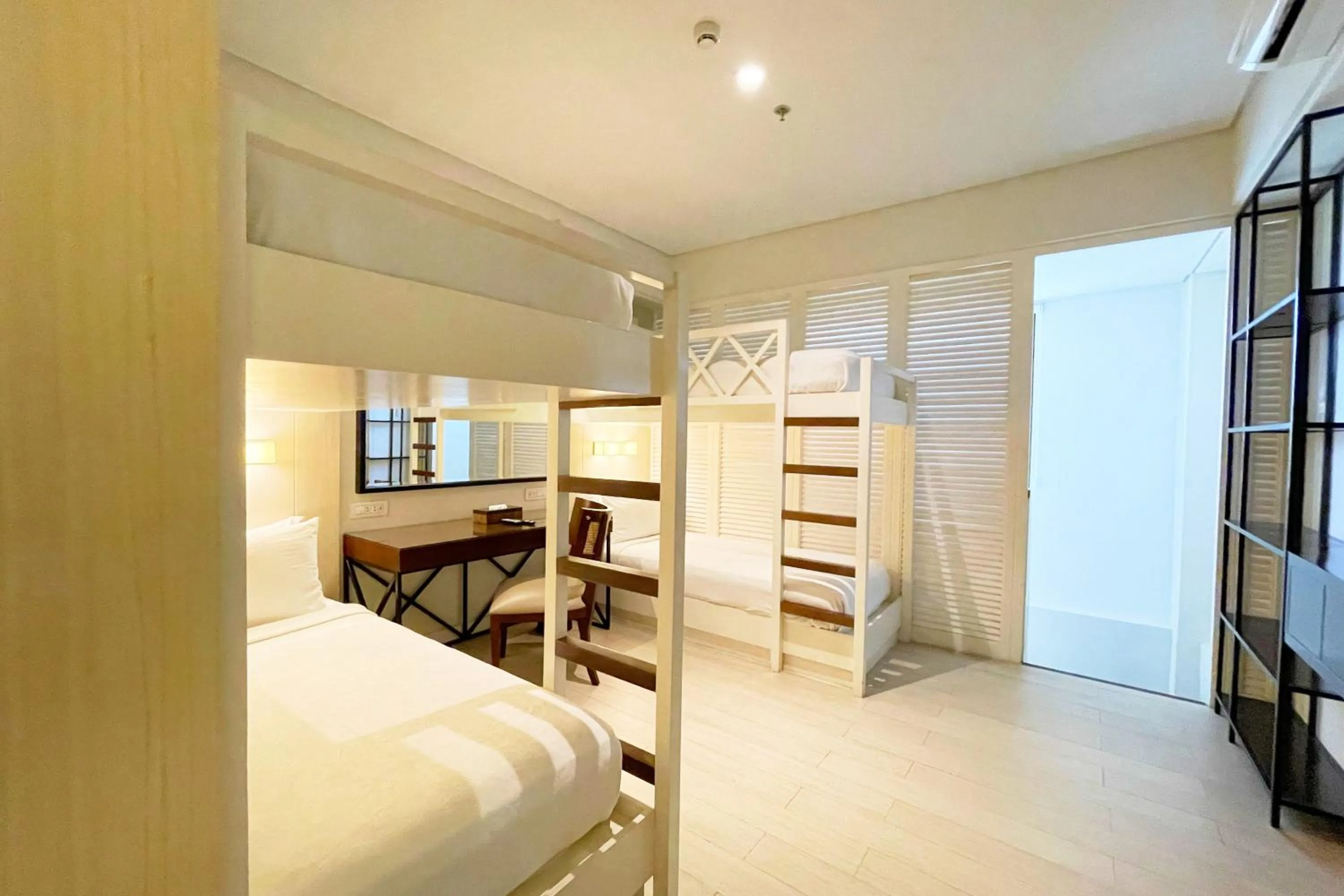 Bed in Mella Hotel Manila near NAIA Airport