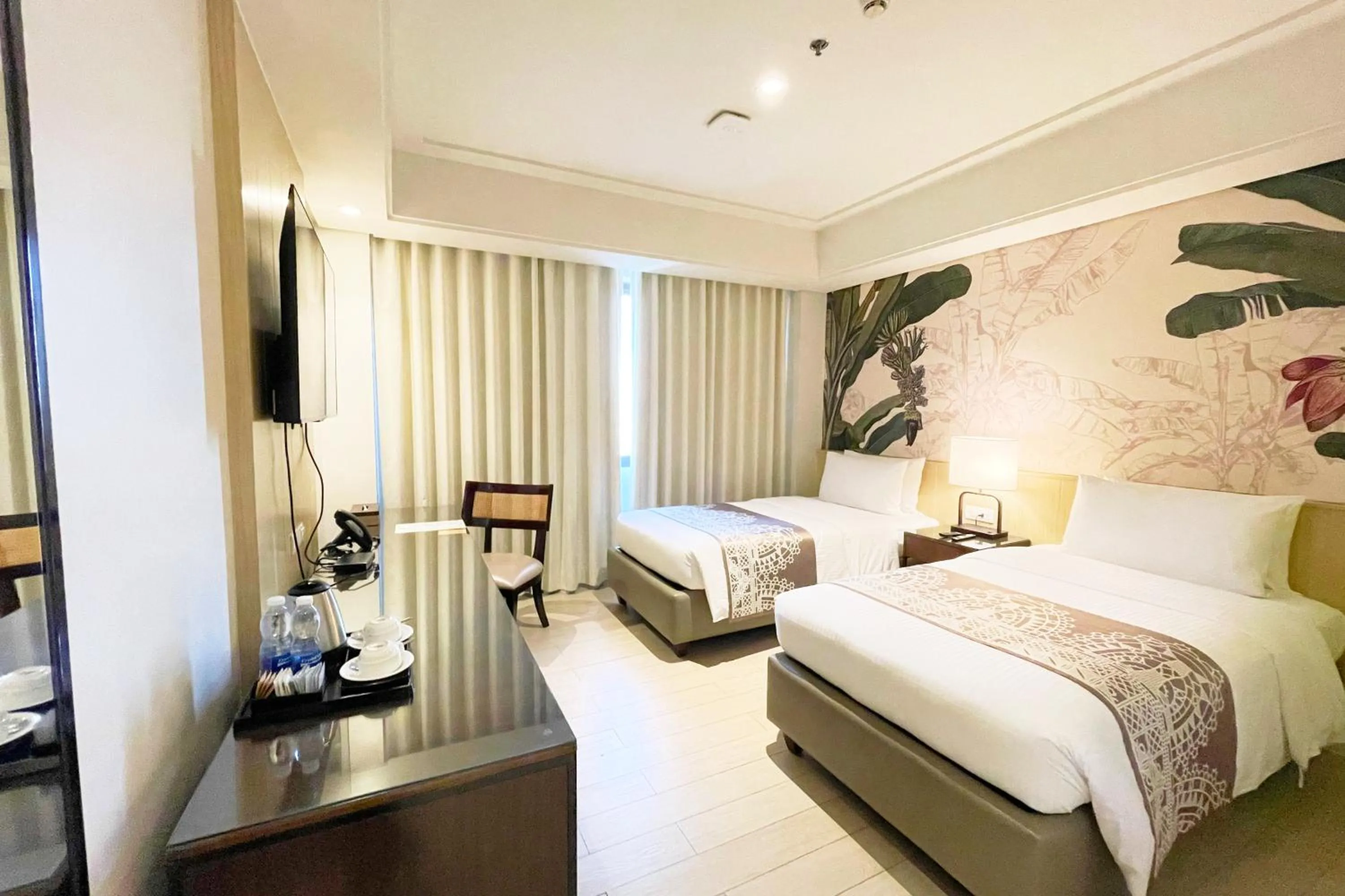 Bed in Mella Hotel Manila near NAIA Airport