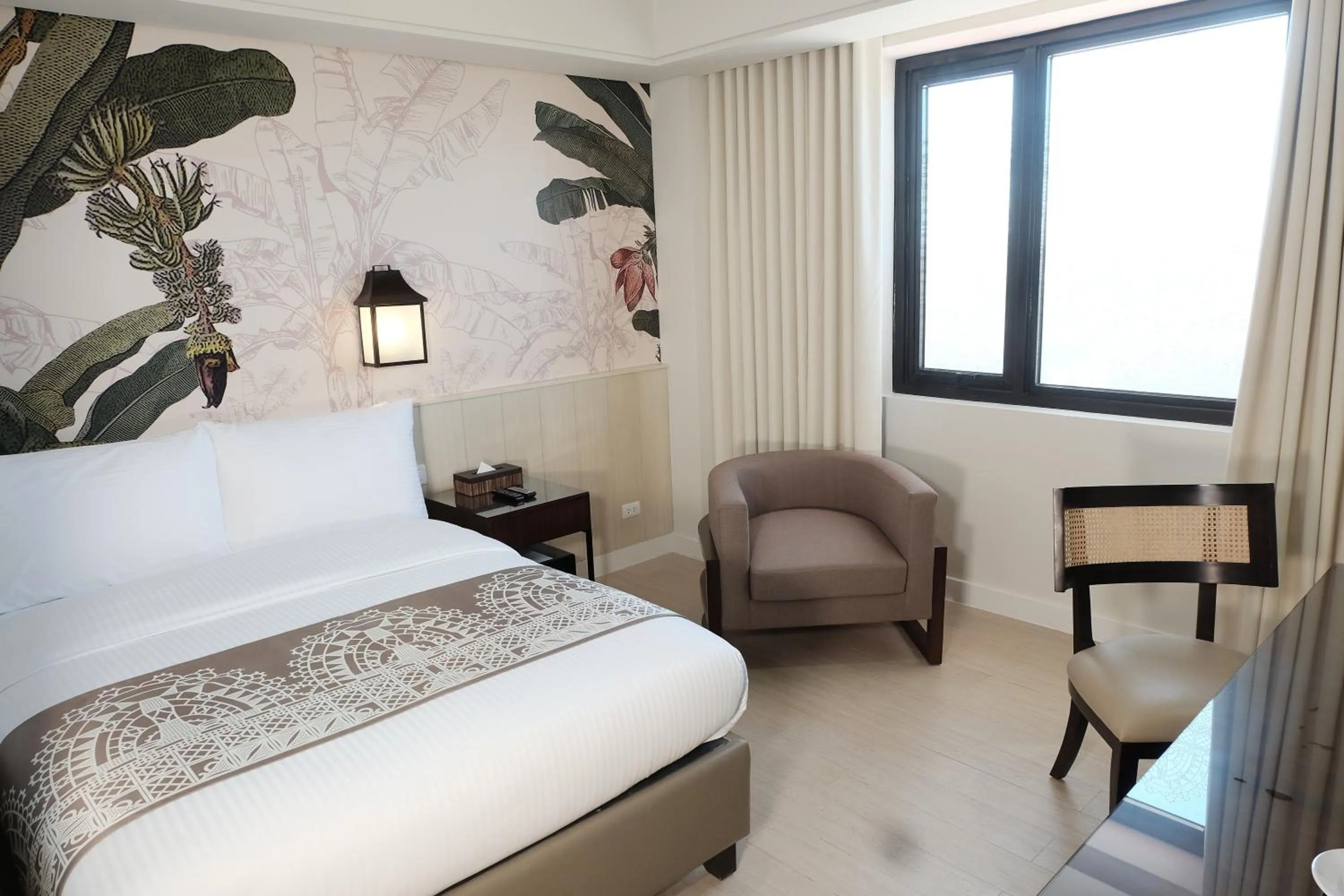 Bed in Mella Hotel Manila near NAIA Airport