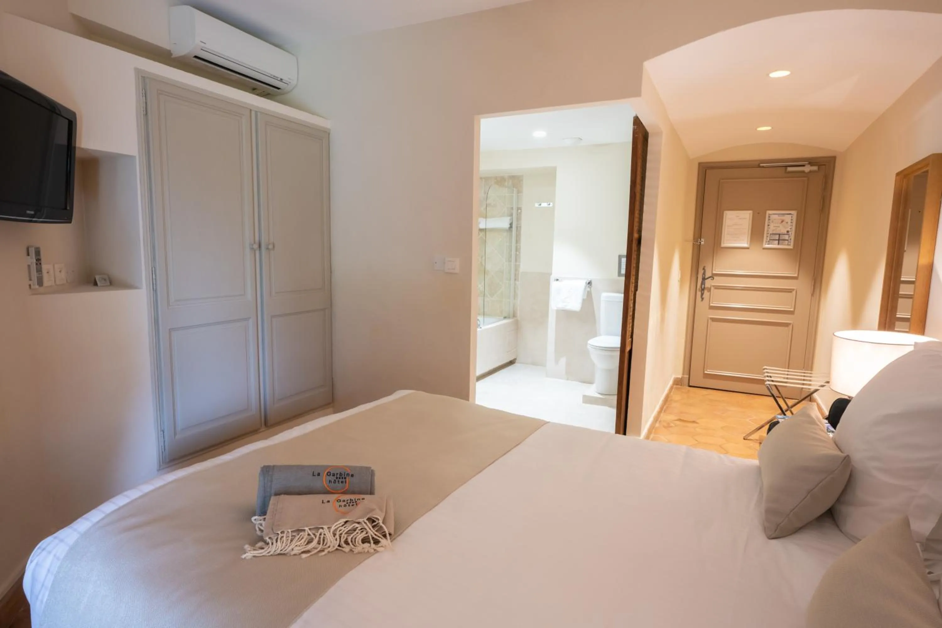 Bed in Hotel La Garbine