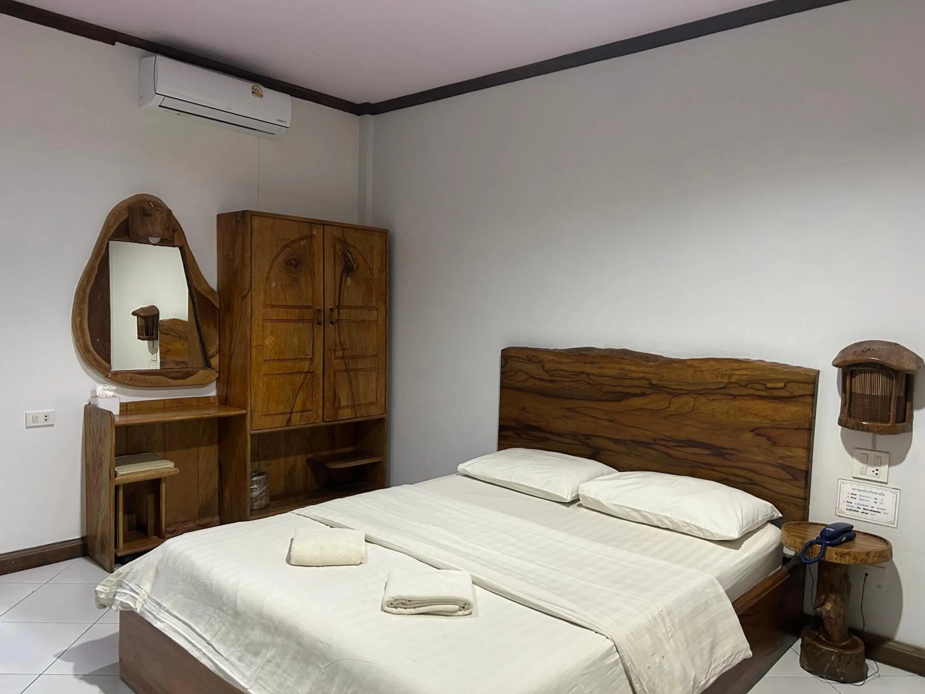 Bed in Magmai HomestayTak