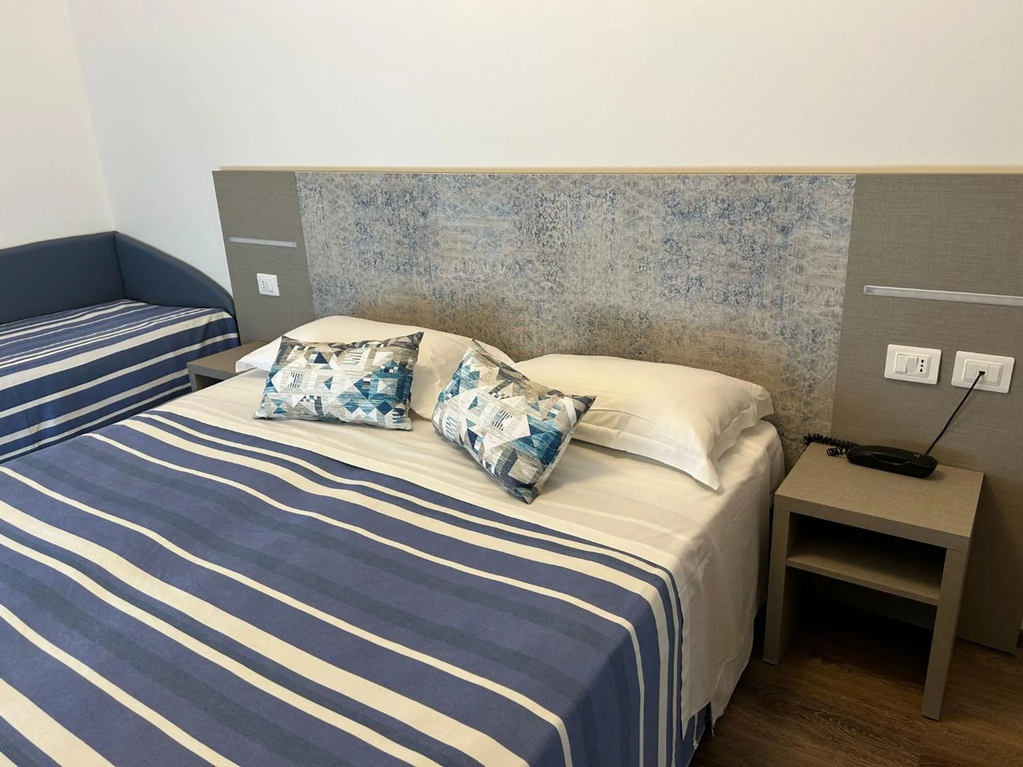 Bedroom in Real Park Hotel