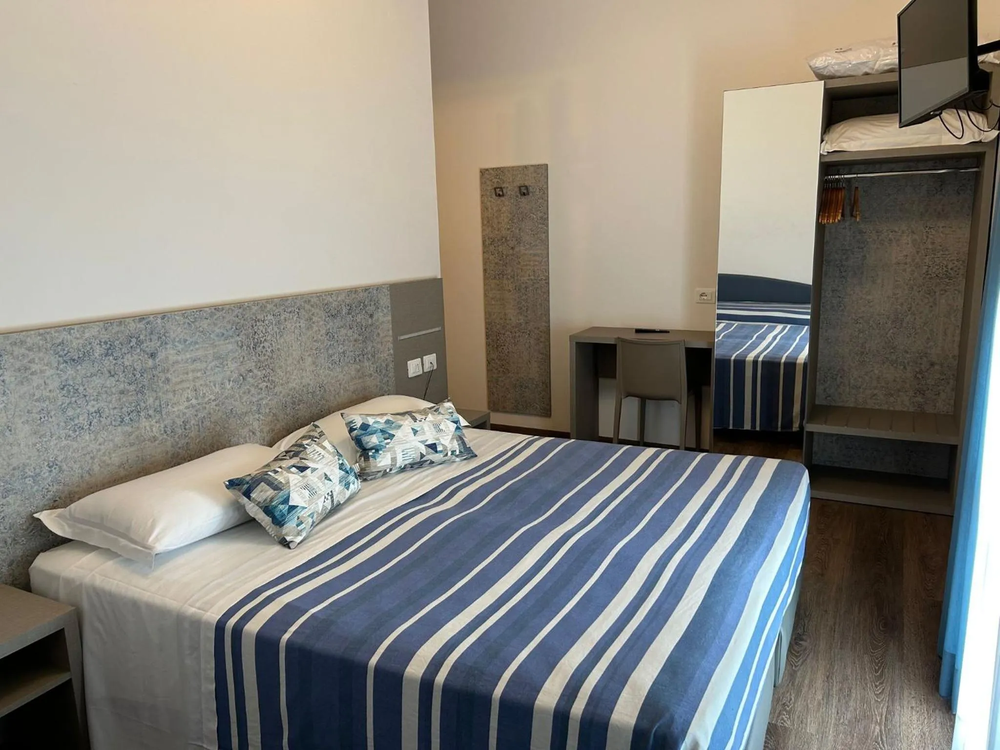 Bedroom in Real Park Hotel