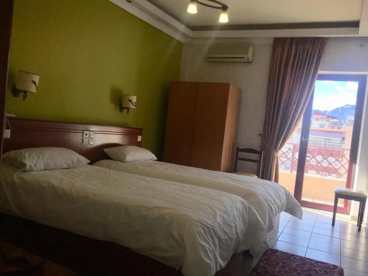 Bed in Hotel Olympion