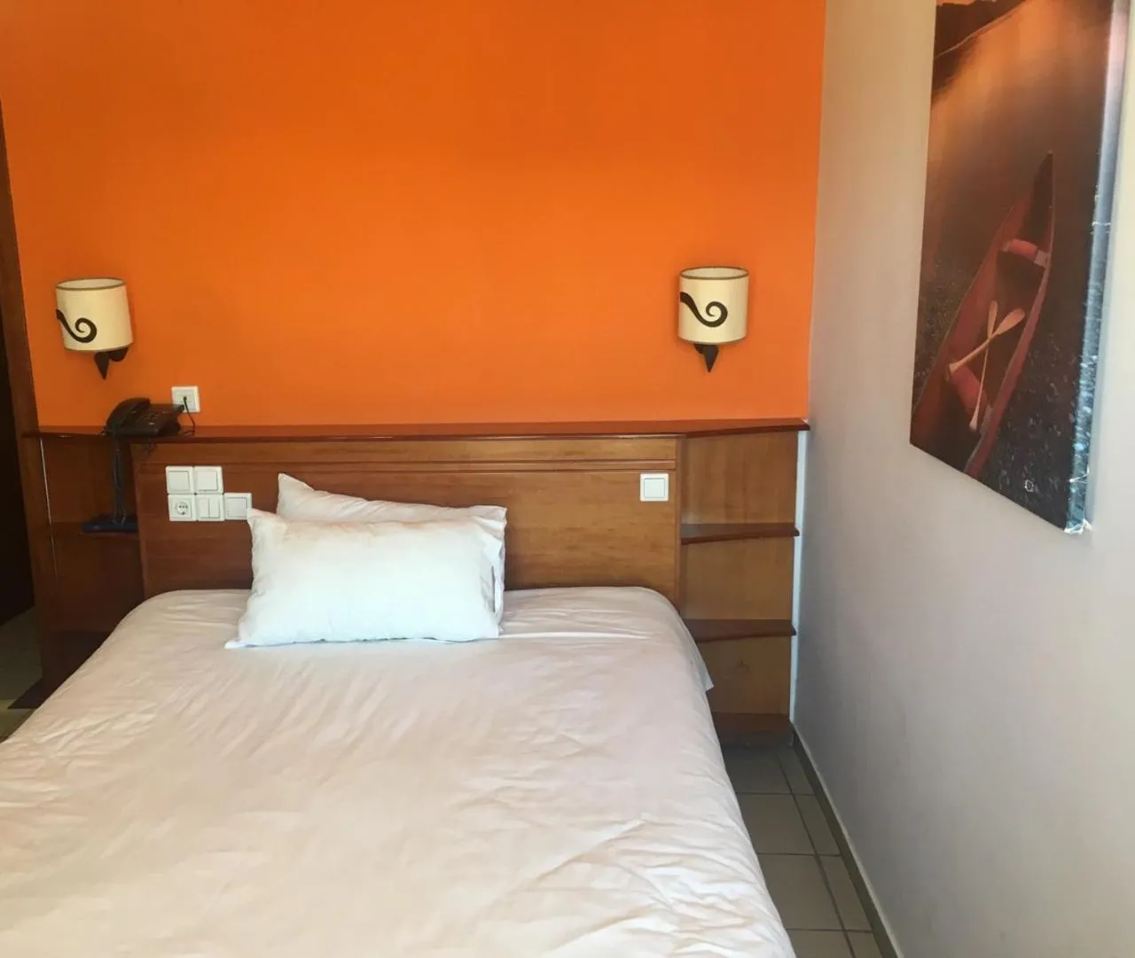 Bed in Hotel Olympion