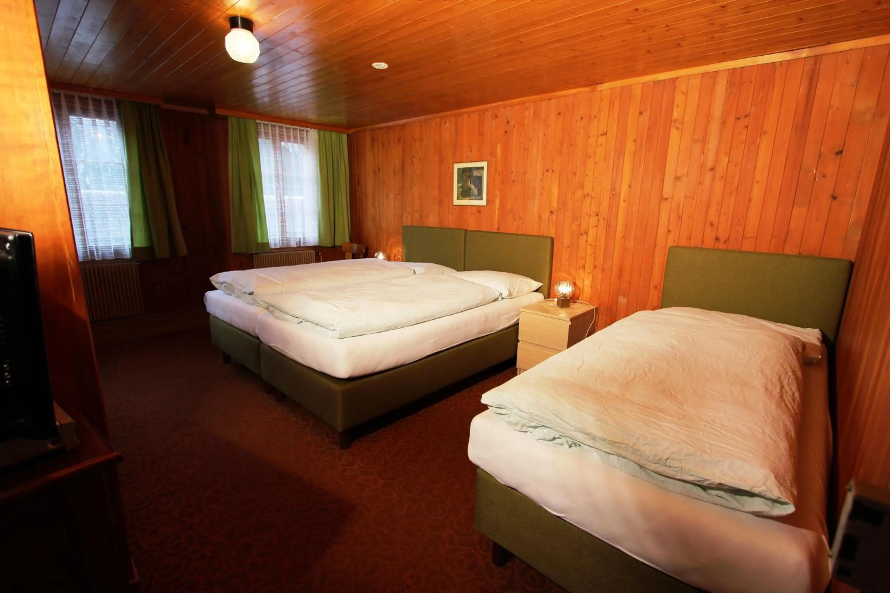 Photo of the whole room, Bed in Hotel-Restaurant Alpina