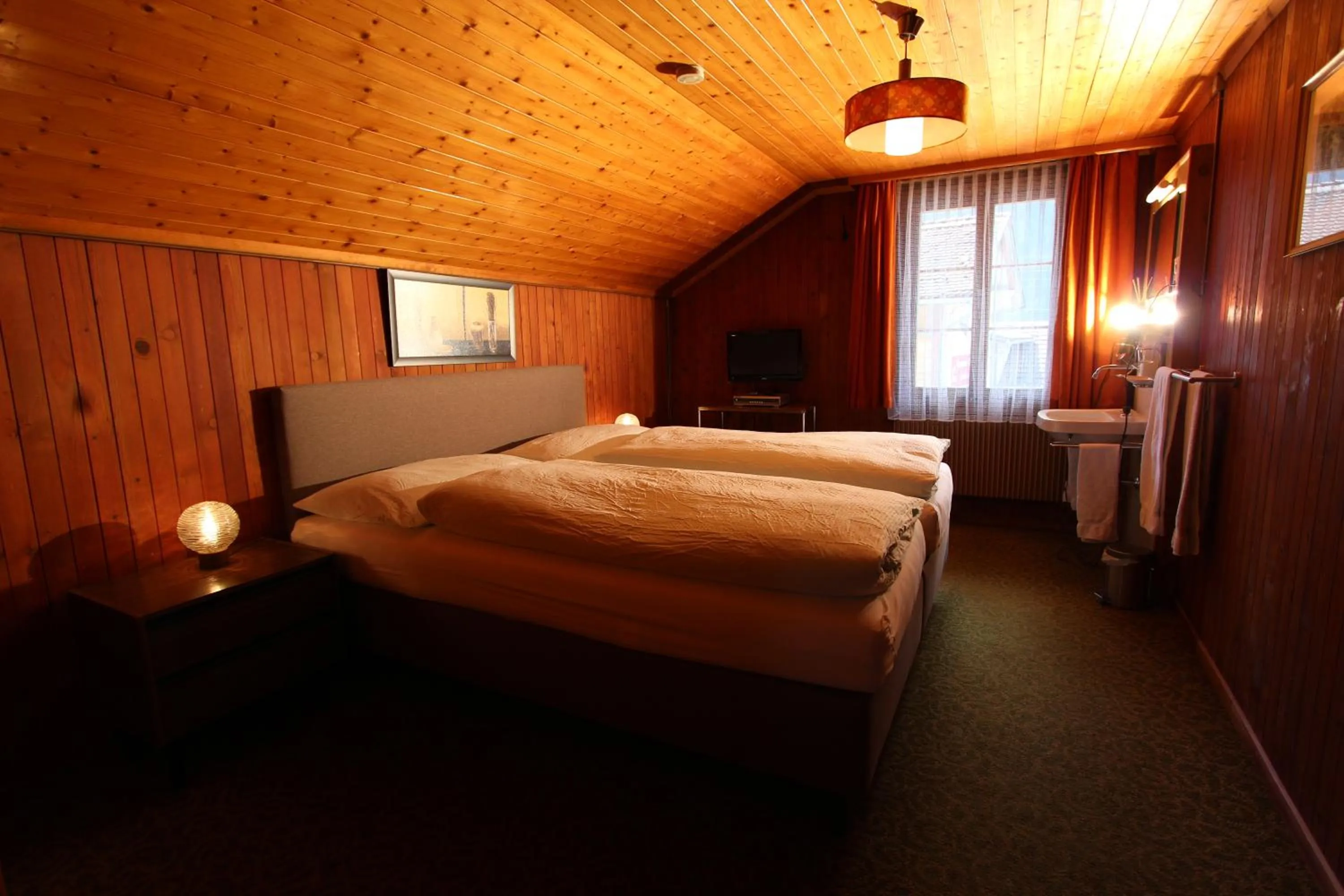 Photo of the whole room, Bed in Hotel-Restaurant Alpina