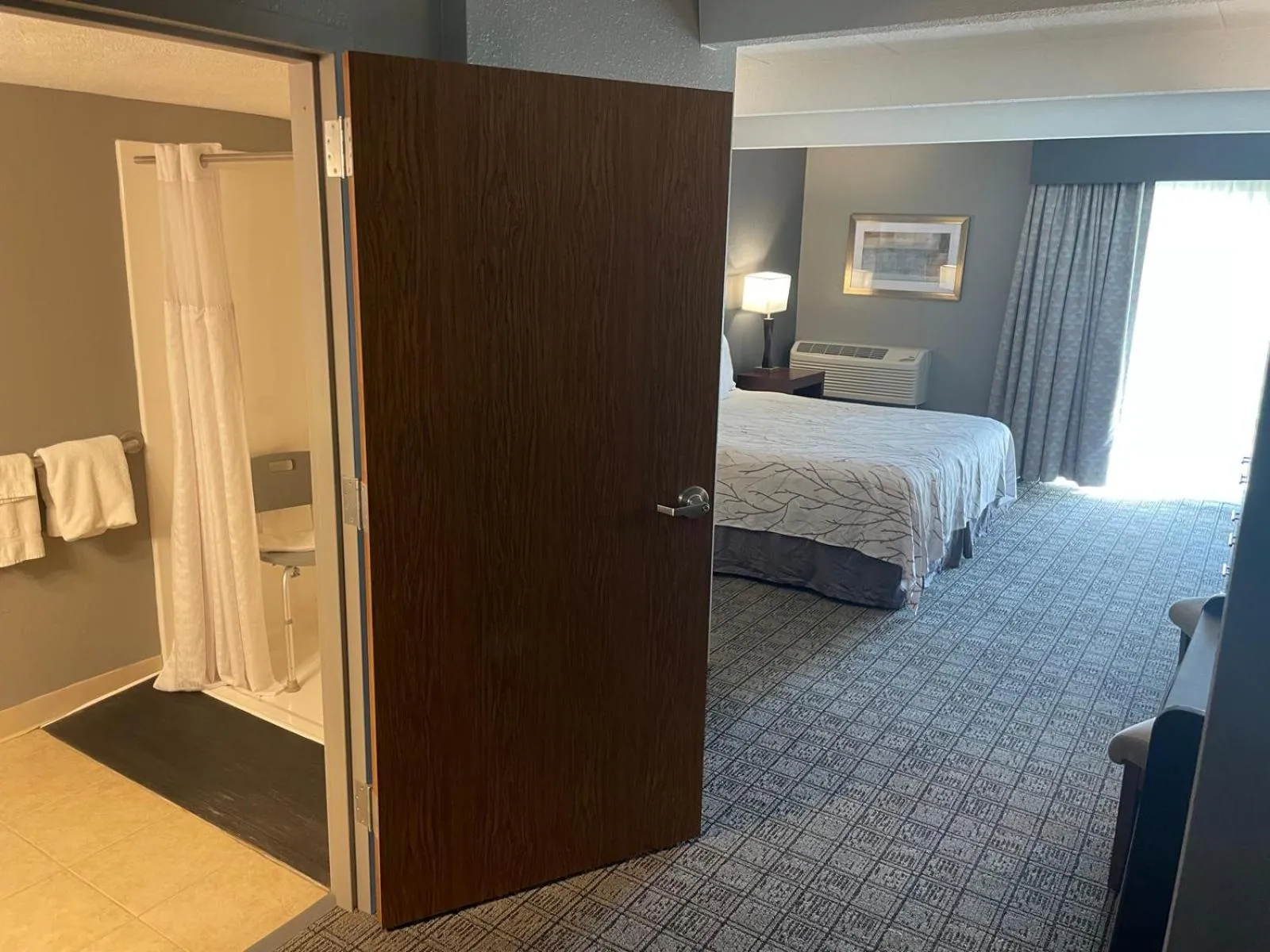 Bedroom, Bed in Eastlake Suites Hotel & Conference Center By OYO Urbana