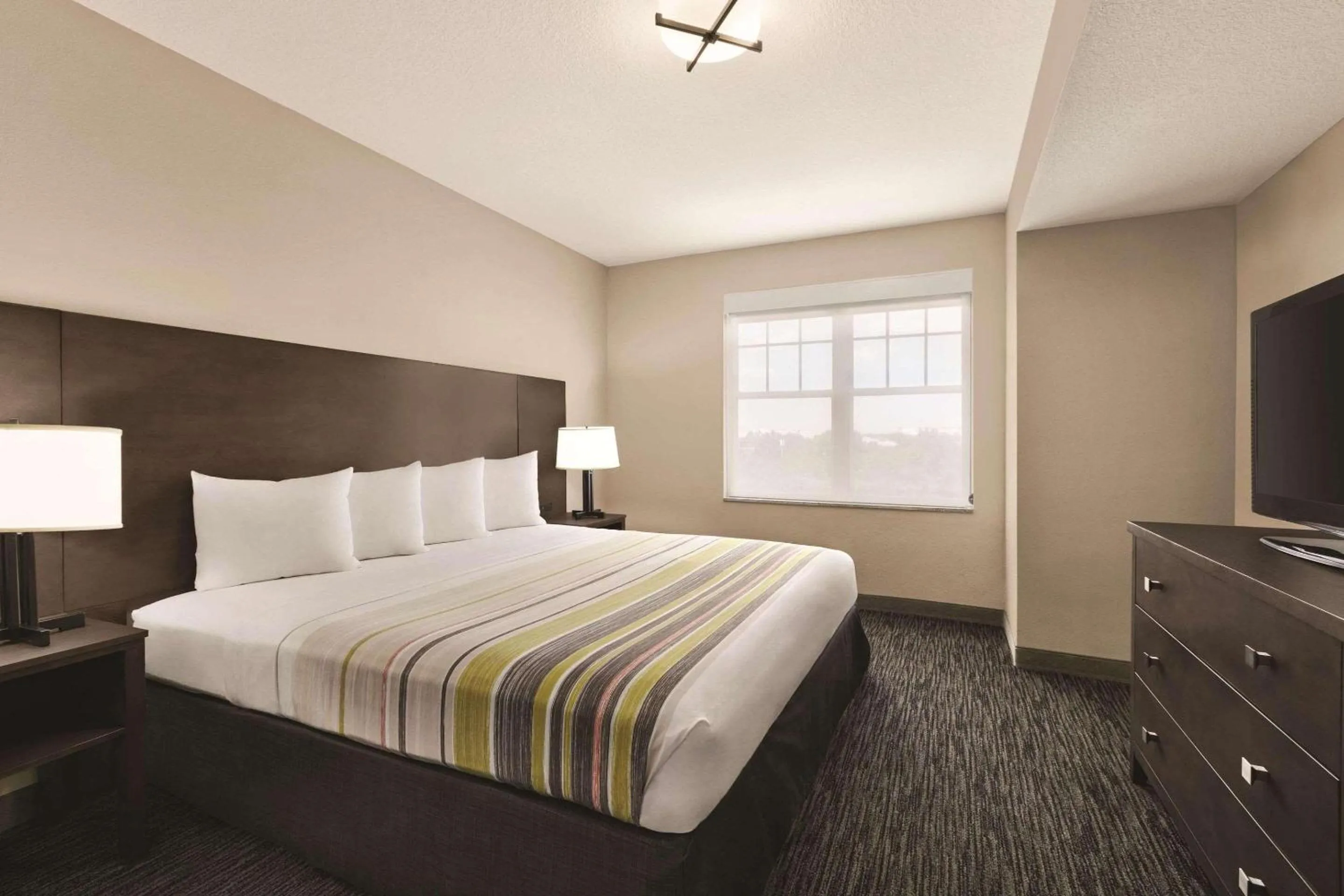 Bedroom, Bed in Country Inn & Suites by Radisson, Tampa-Brandon, FL