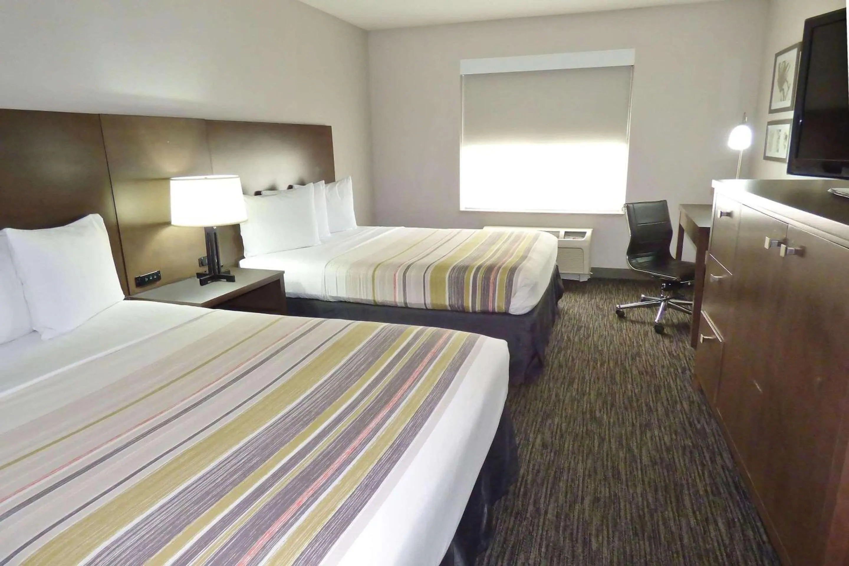 Bedroom, Bed in Country Inn & Suites by Radisson, Tampa-Brandon, FL