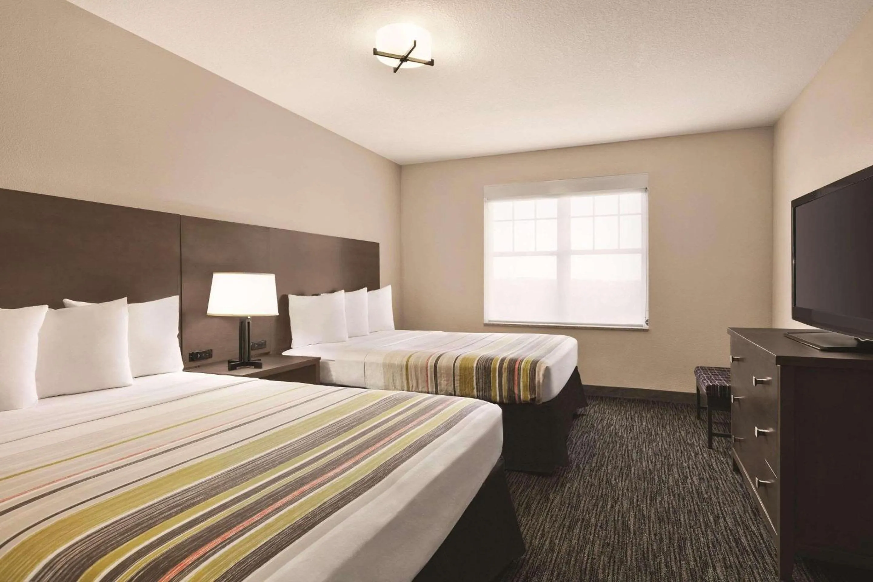 Bedroom, Bed in Country Inn & Suites by Radisson, Tampa-Brandon, FL