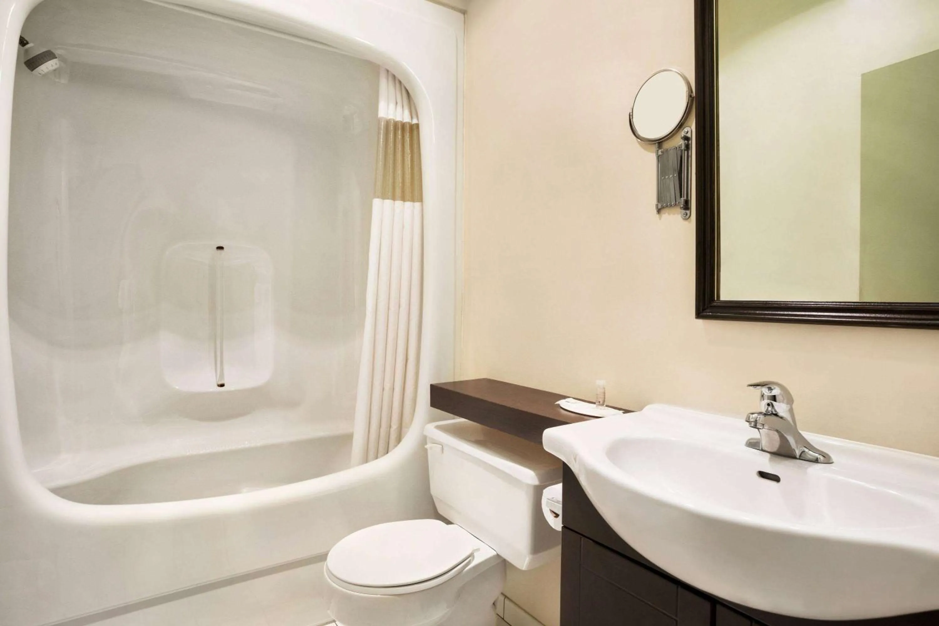 Bathroom in Days Inn by Wyndham Ste. Helene-de-Bagot