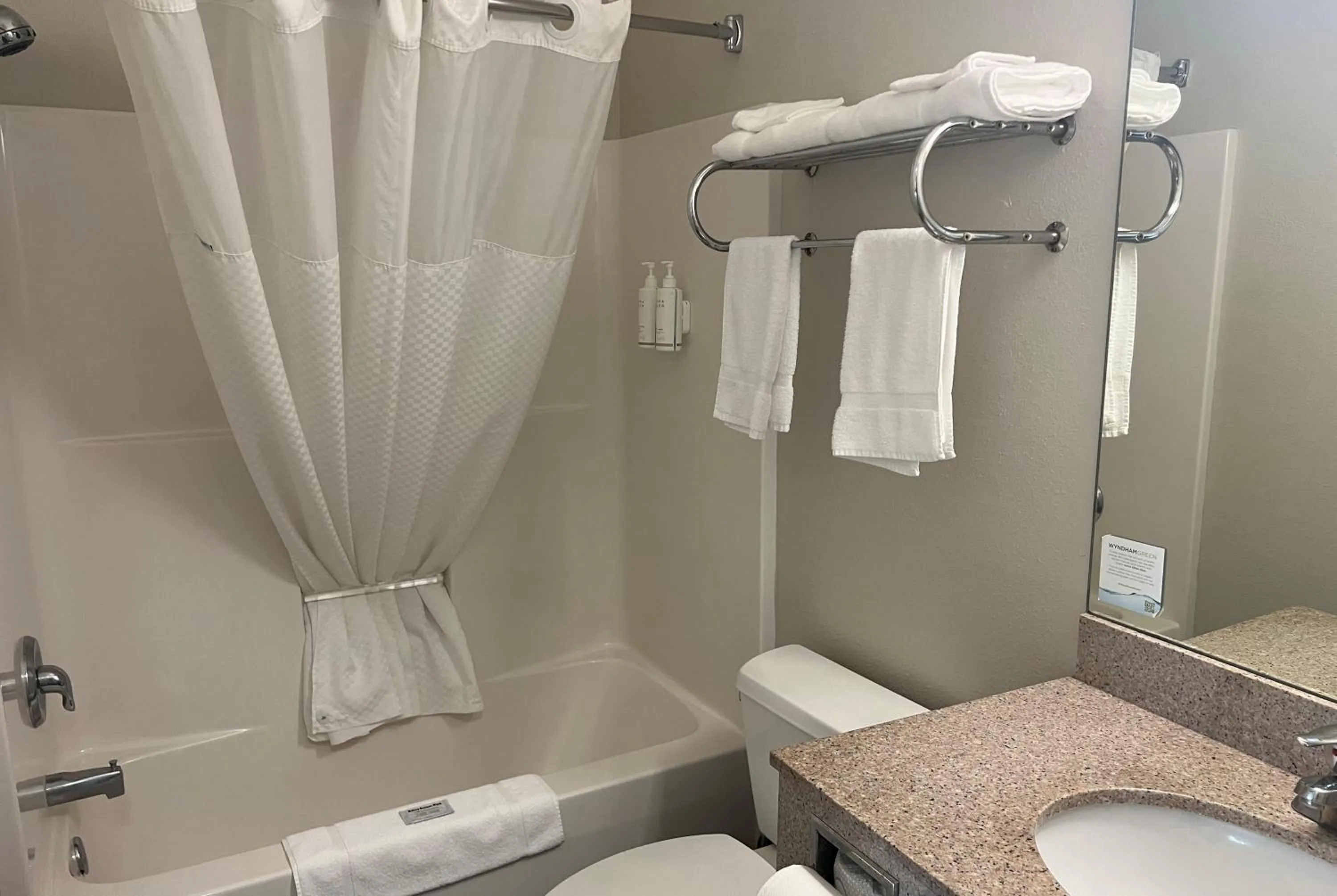 Bathroom in Days Inn & Suites by Wyndham Columbus NE