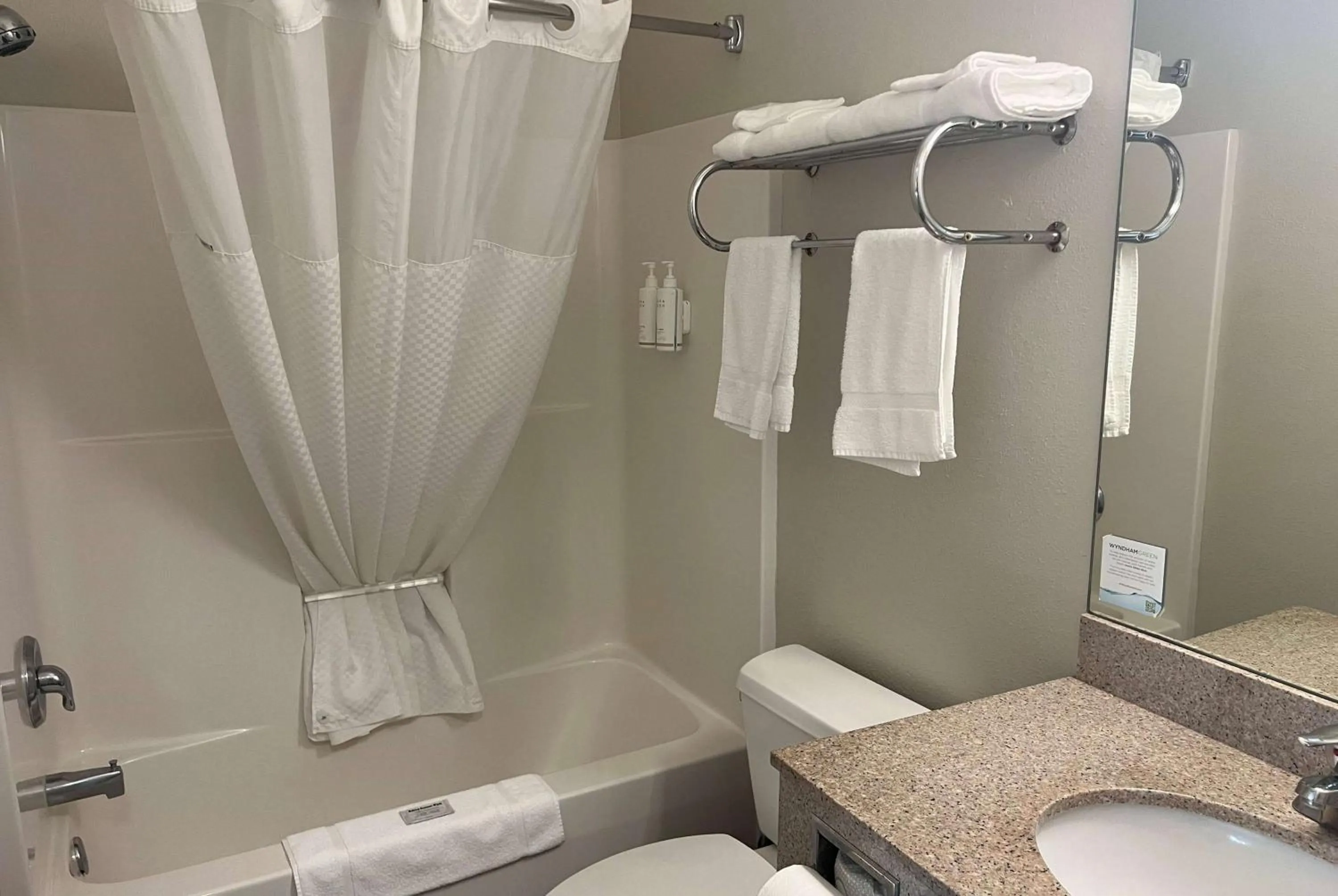 Bathroom in Days Inn & Suites by Wyndham Columbus NE