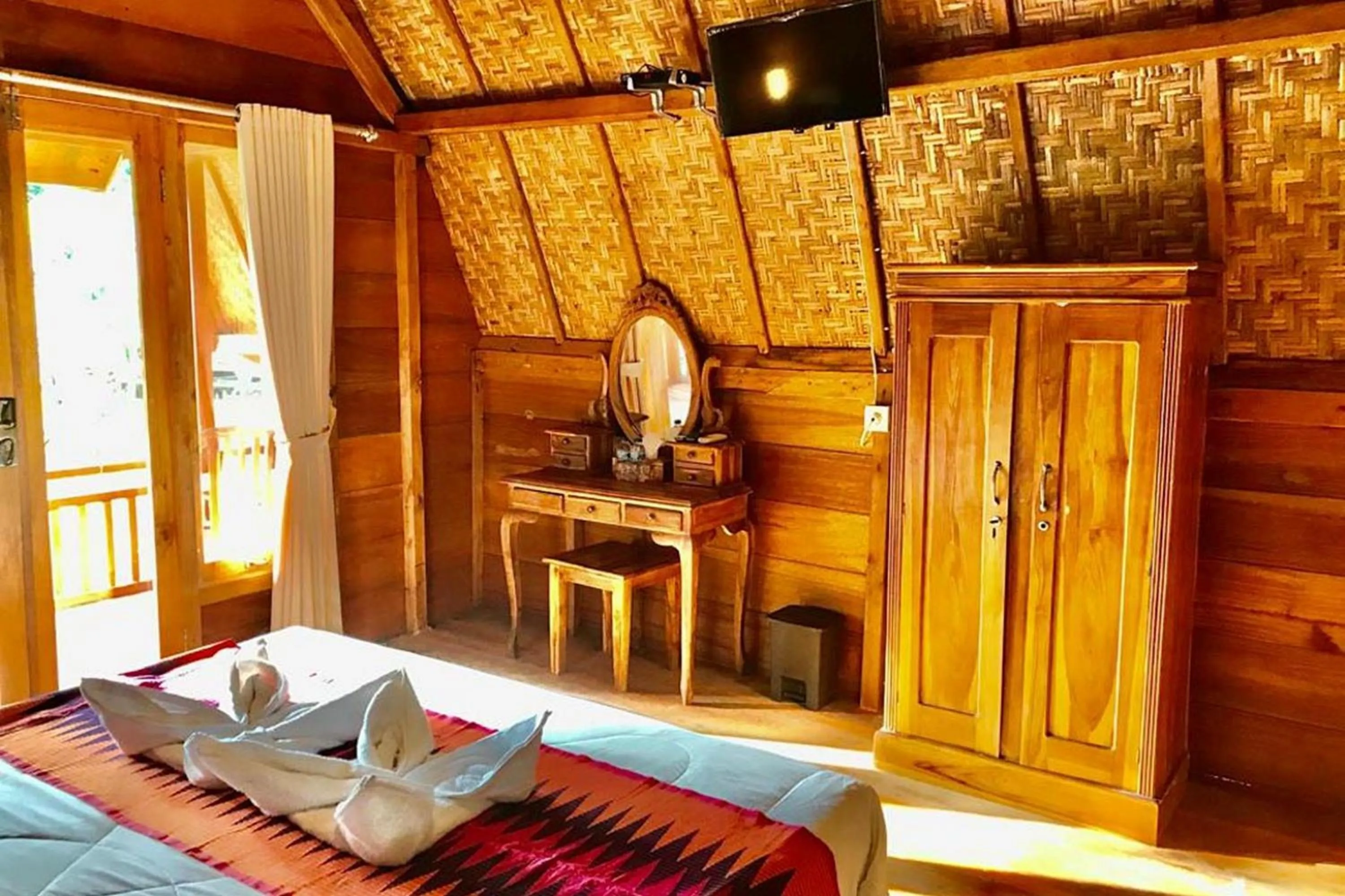 TV and multimedia, Bed in Kubu Sental Cottage